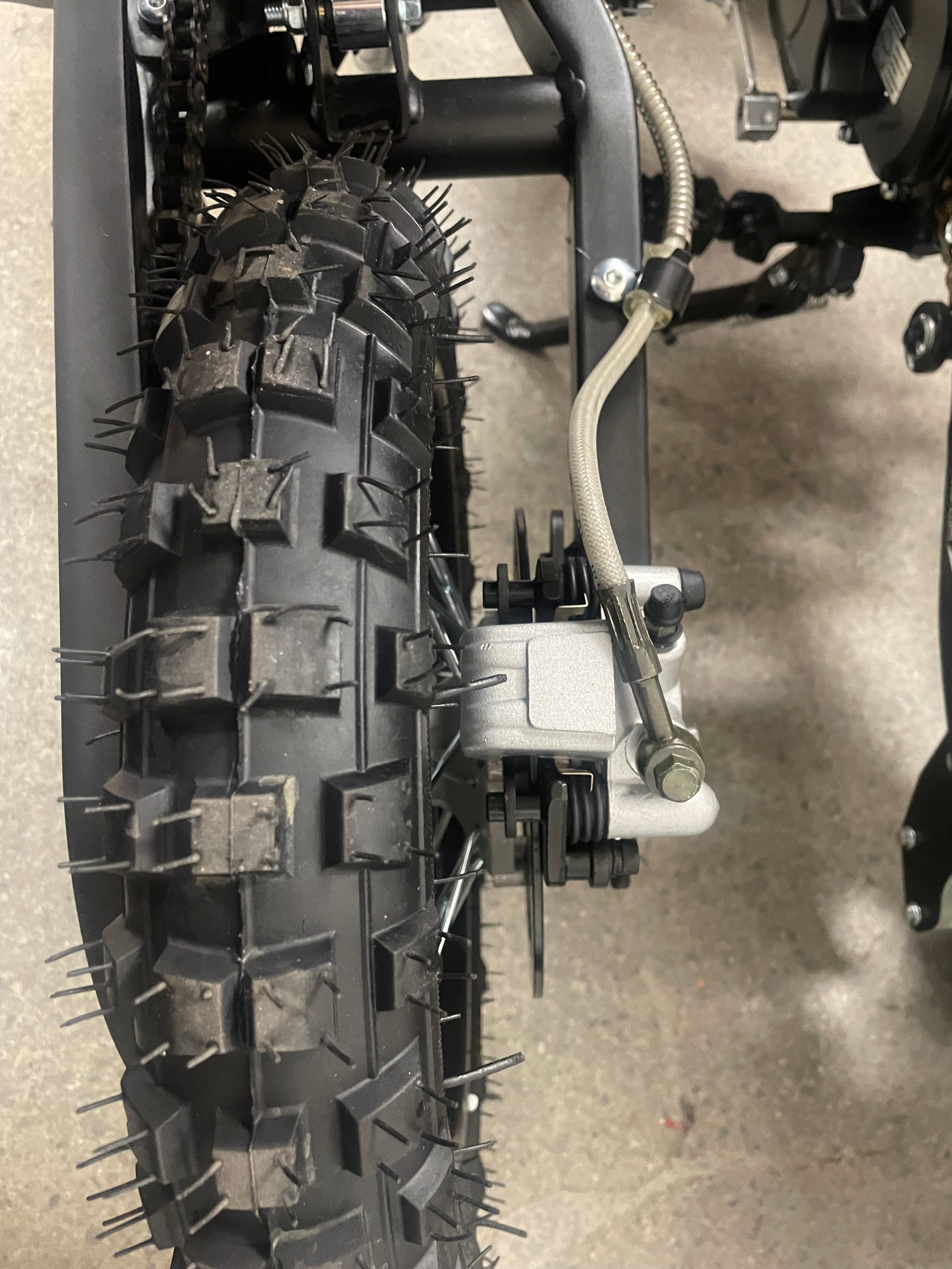 The SYXMOTO Tearoff 10-inch alloy wheels