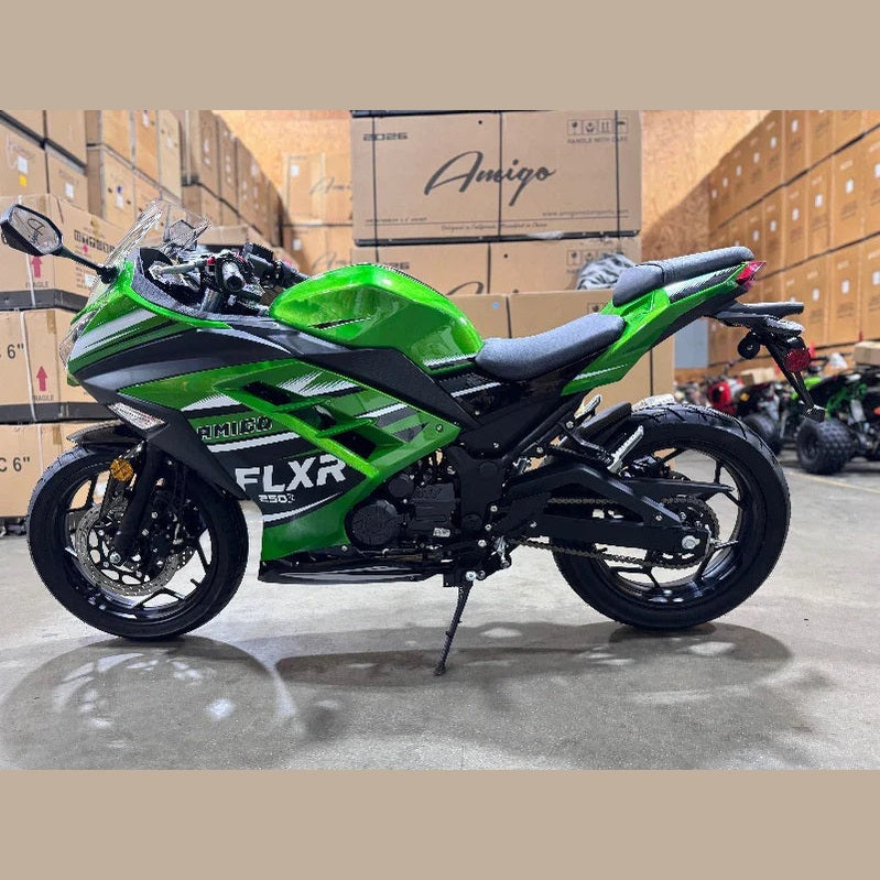 Side profile of green Amigo FLXR 250i motorcycle showing chain drive and disc brakes