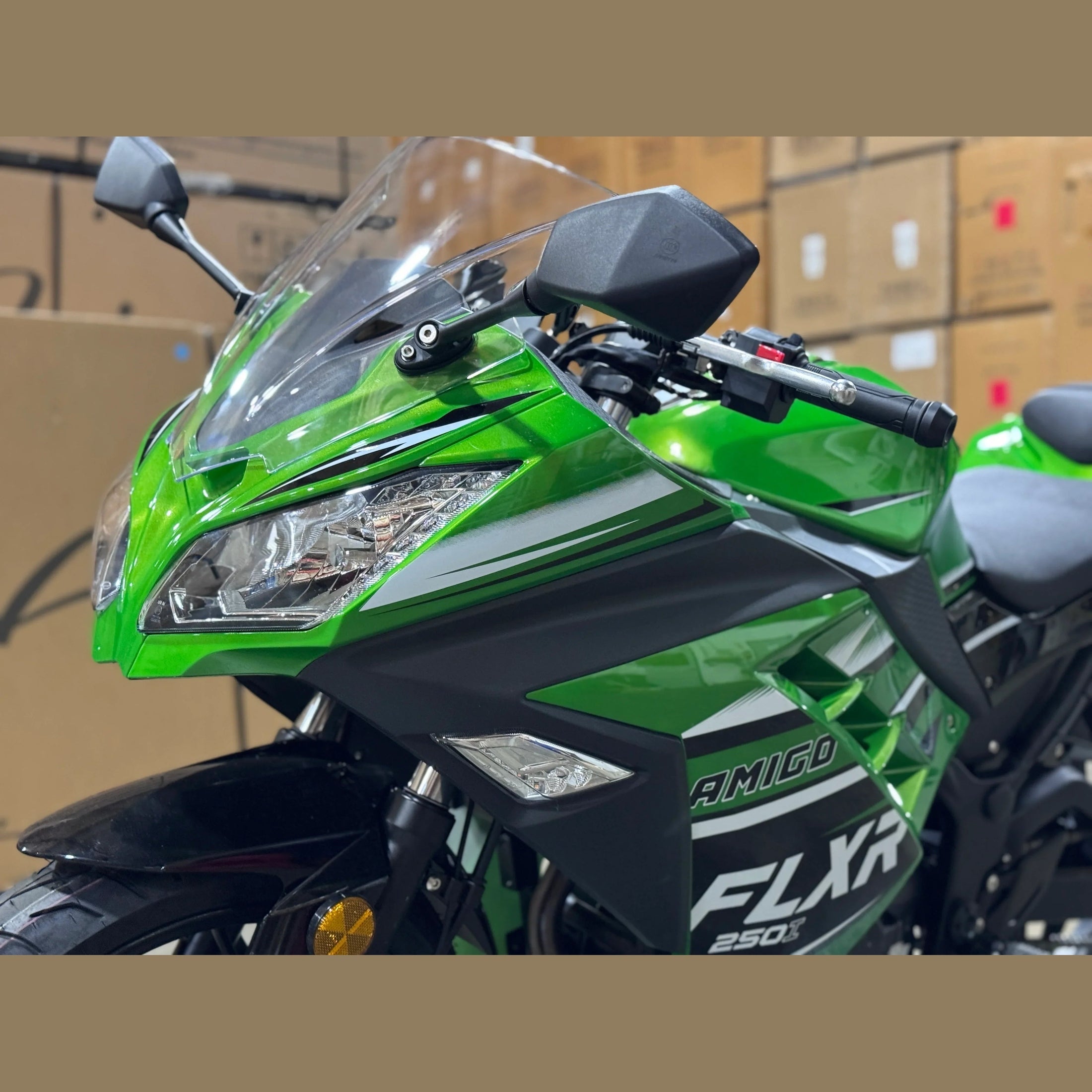 Green and black Amigo FLXR 250i sport motorcycle front view with windscreen