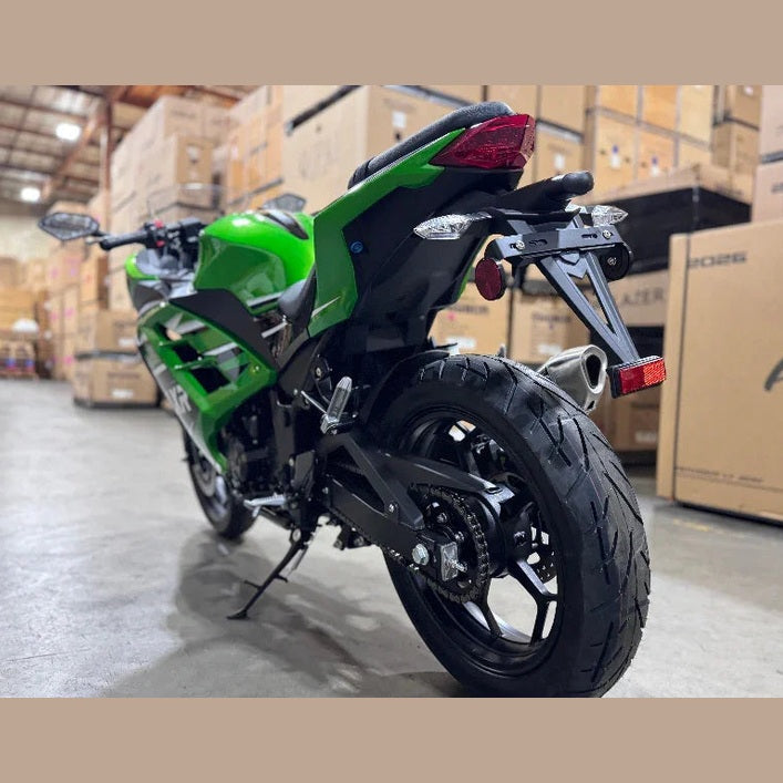 Rear view of green Amigo FLXR 250i motorcycle highlighting exhaust and knobby tire