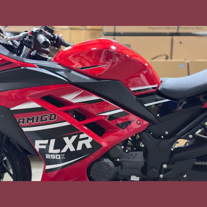 Close-up of glossy red fuel tank on Amigo FLXR 250i motorcycle