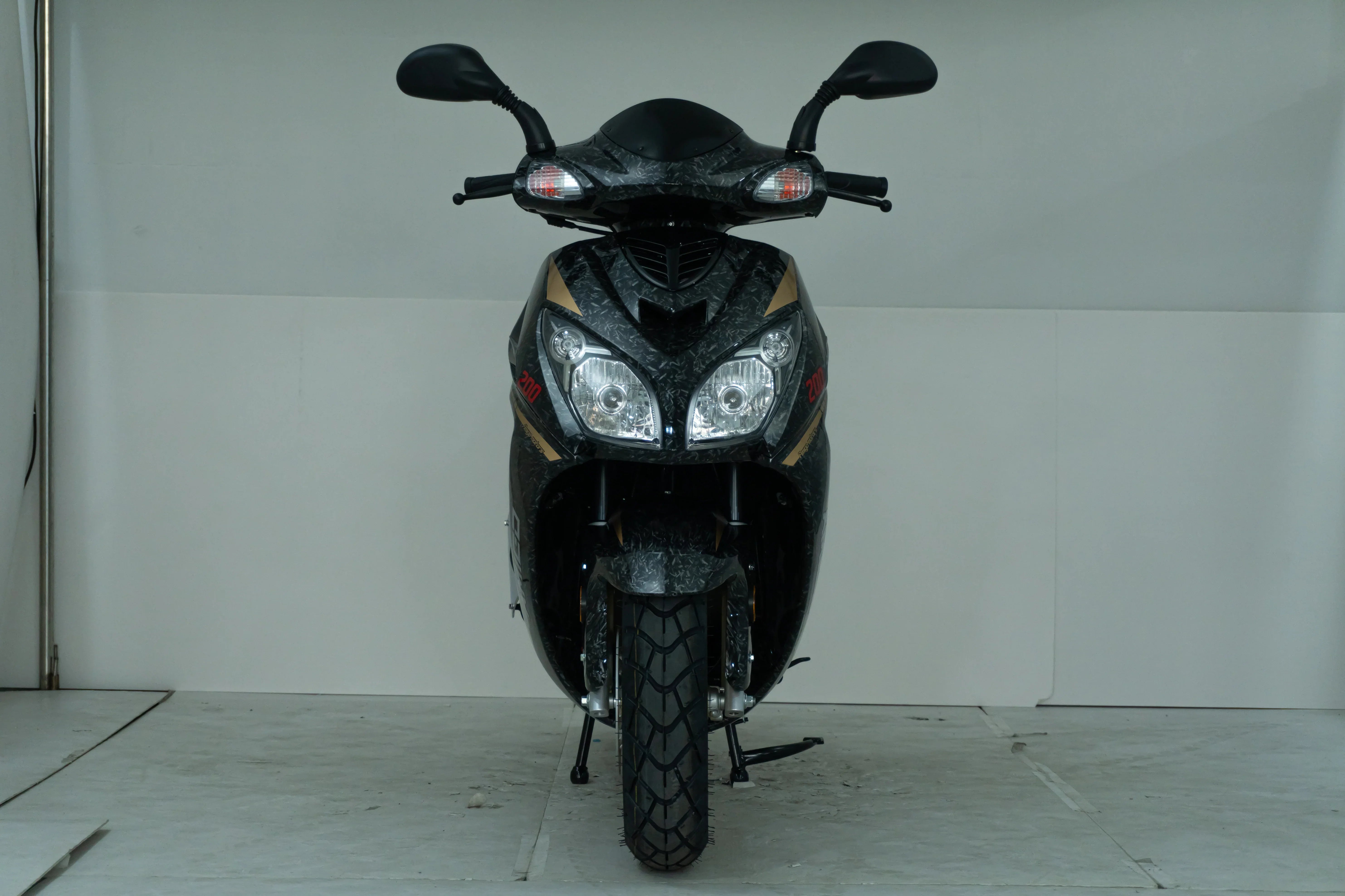 Black 200cc scooter with dual headlights and sporty design for urban commuting