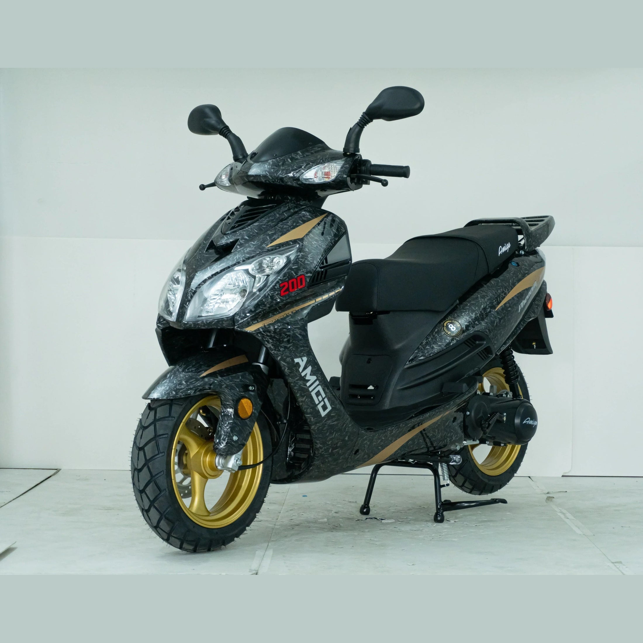 Black and gold Amigo 200cc scooter with dual headlights and sporty design on white background