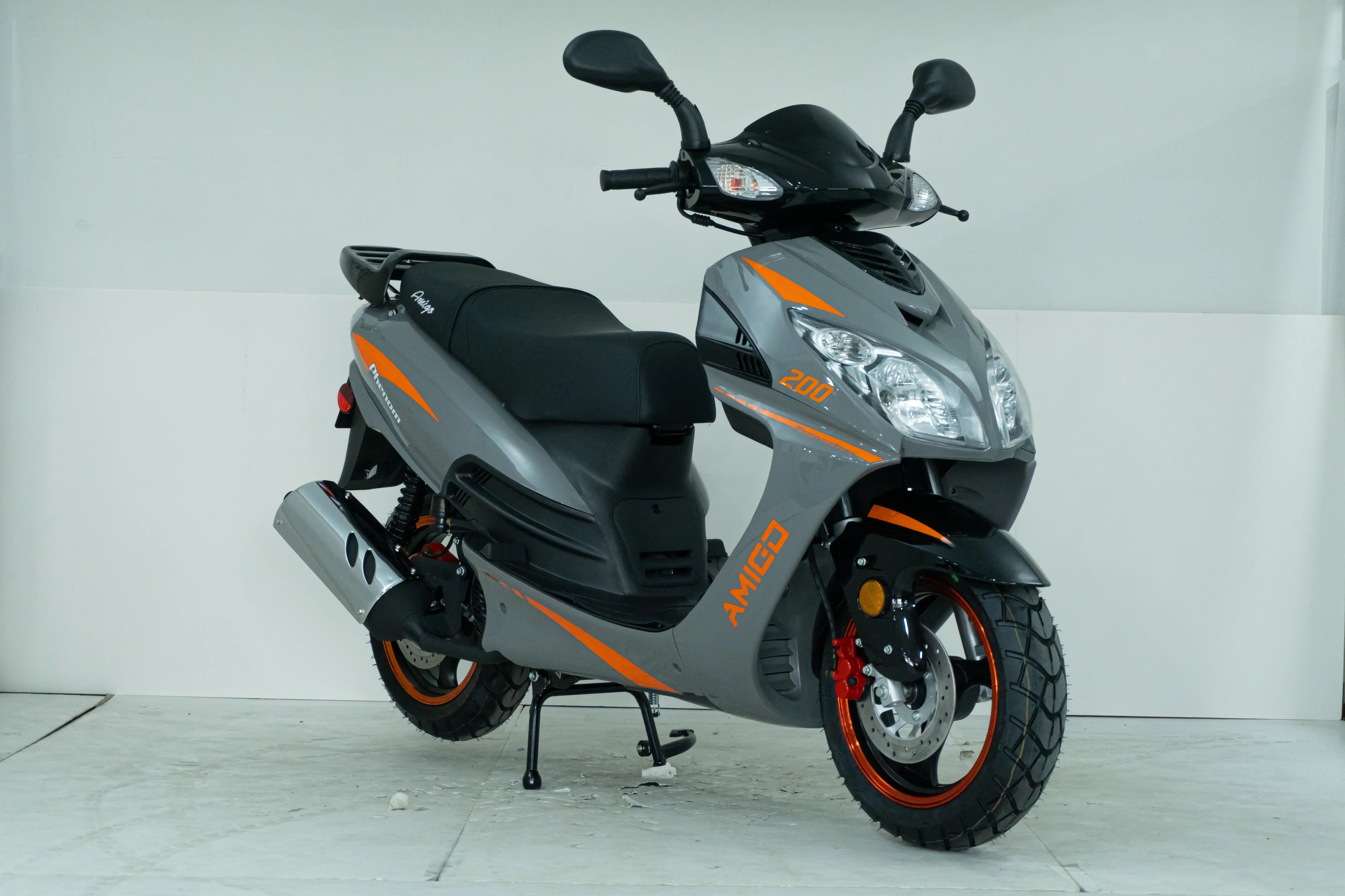 Gray and orange Amigo 200cc scooter with rugged tires and sleek design