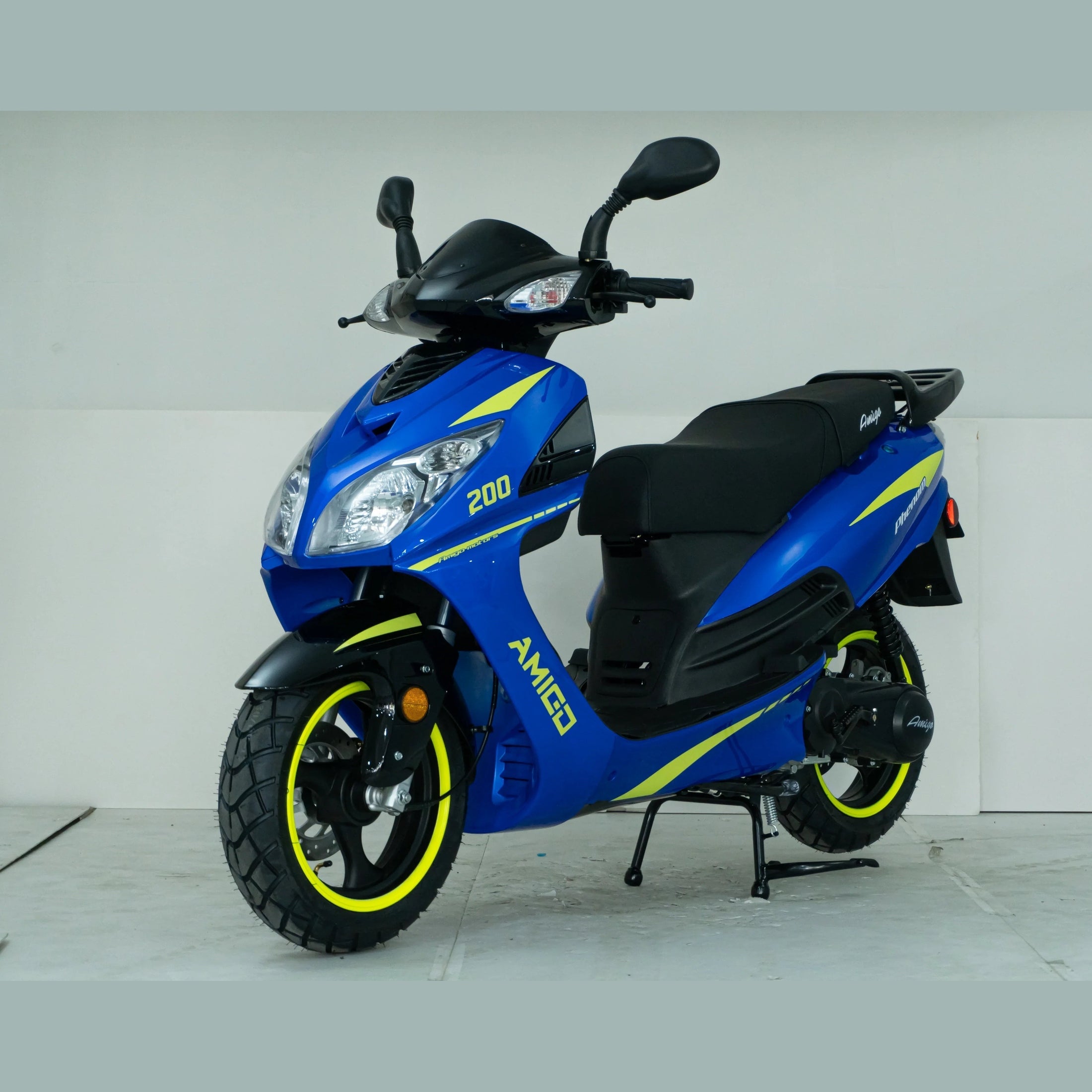 Blue Amigo 200cc scooter with yellow accents, dual headlights, and black seat in studio