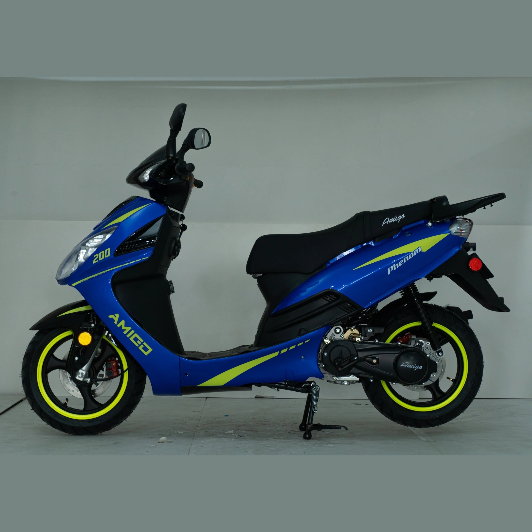 Blue Amigo Phenom 200cc scooter with yellow accents in studio setting