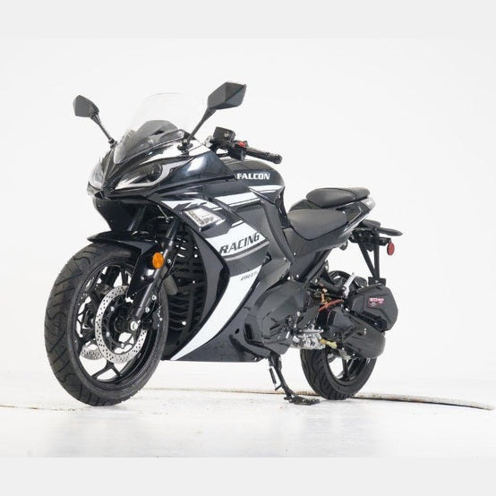 Black motorcycle with white graphics and rear luggage rack side profile view