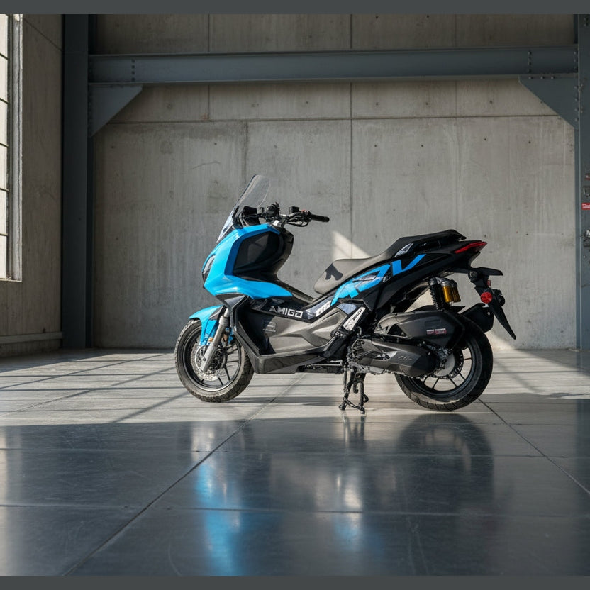 Rear view of blue Amigo 200 scooter showing knobby tires, carbon-fiber fender, and gold shocks