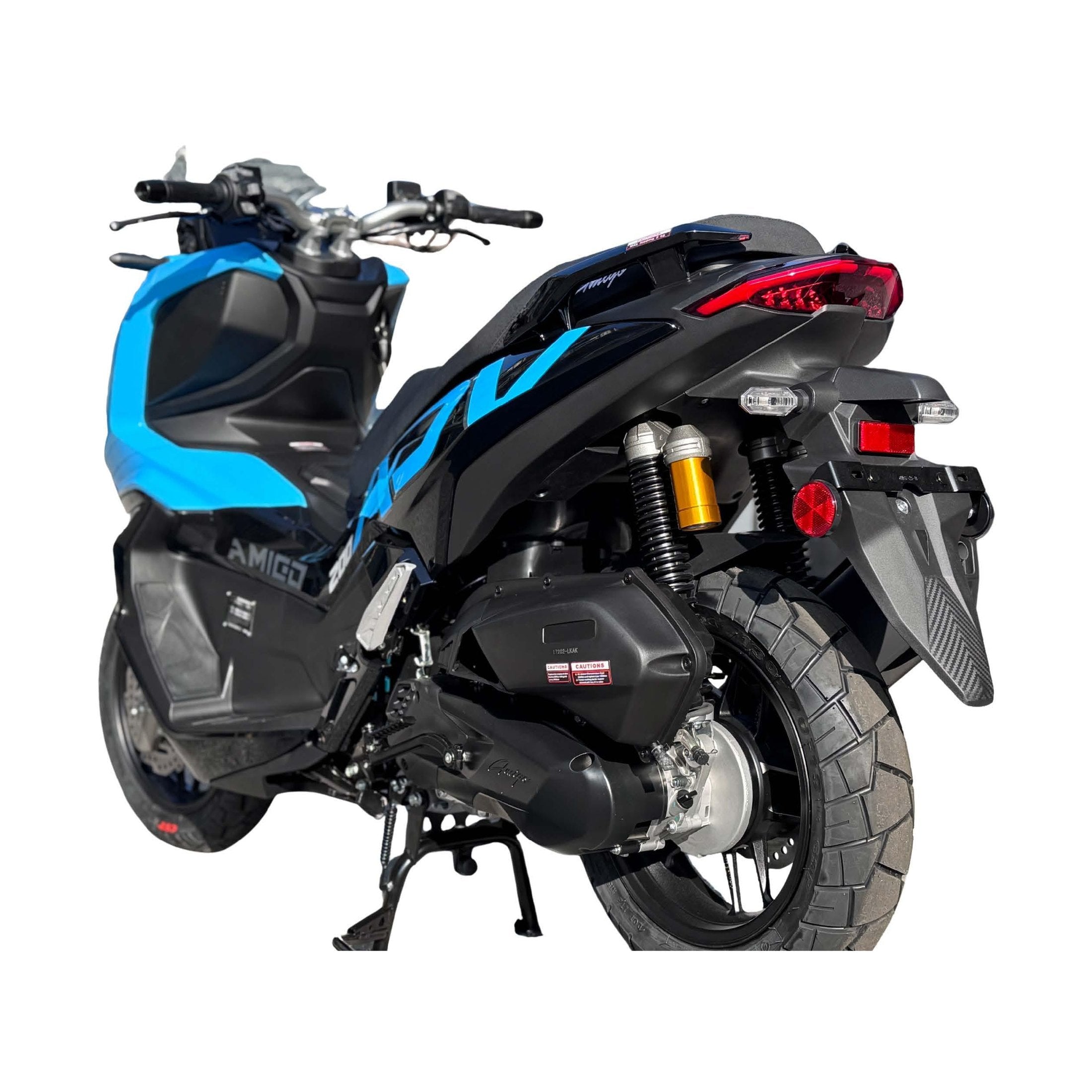 Rear view of blue Amigo 200 scooter showing knobby tires, carbon-fiber fender, and gold shocks