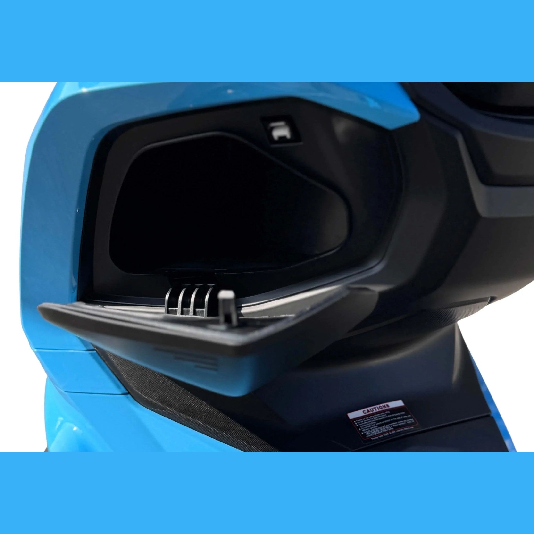 Open under-seat storage compartment on blue Amigo 200 scooter with latch mechanism