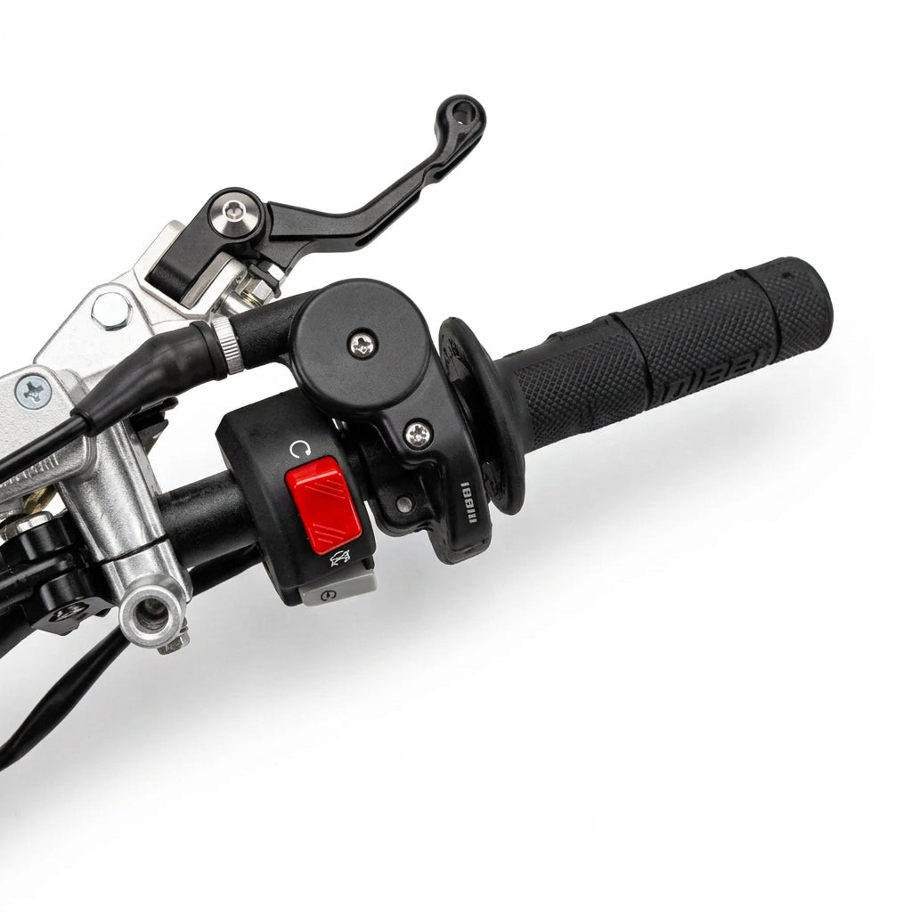 Close-up of Nicot PT2 dirt bike handlebar controls and textured grip