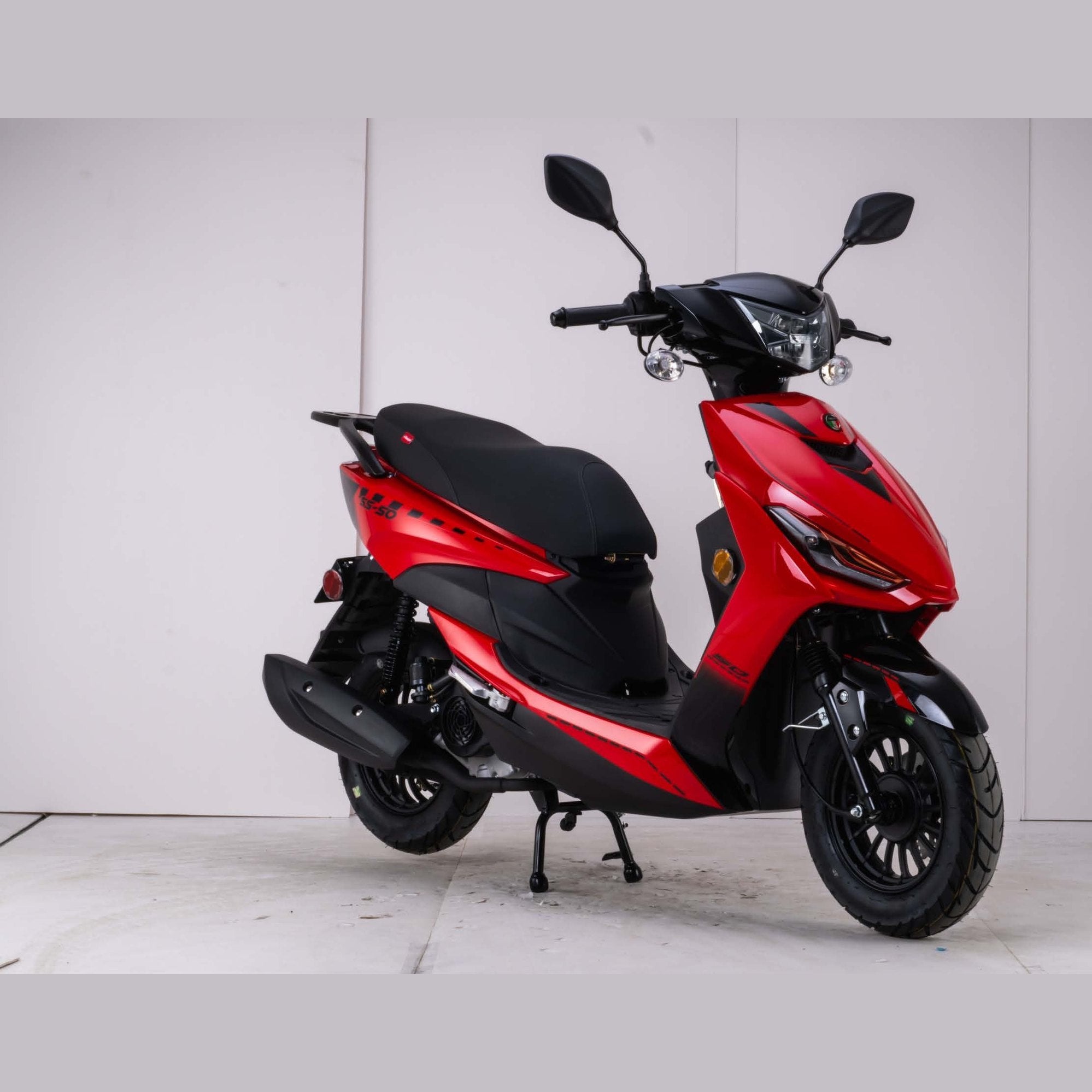 Red and black Amigo SS-200 scooter side profile with auxiliary lights