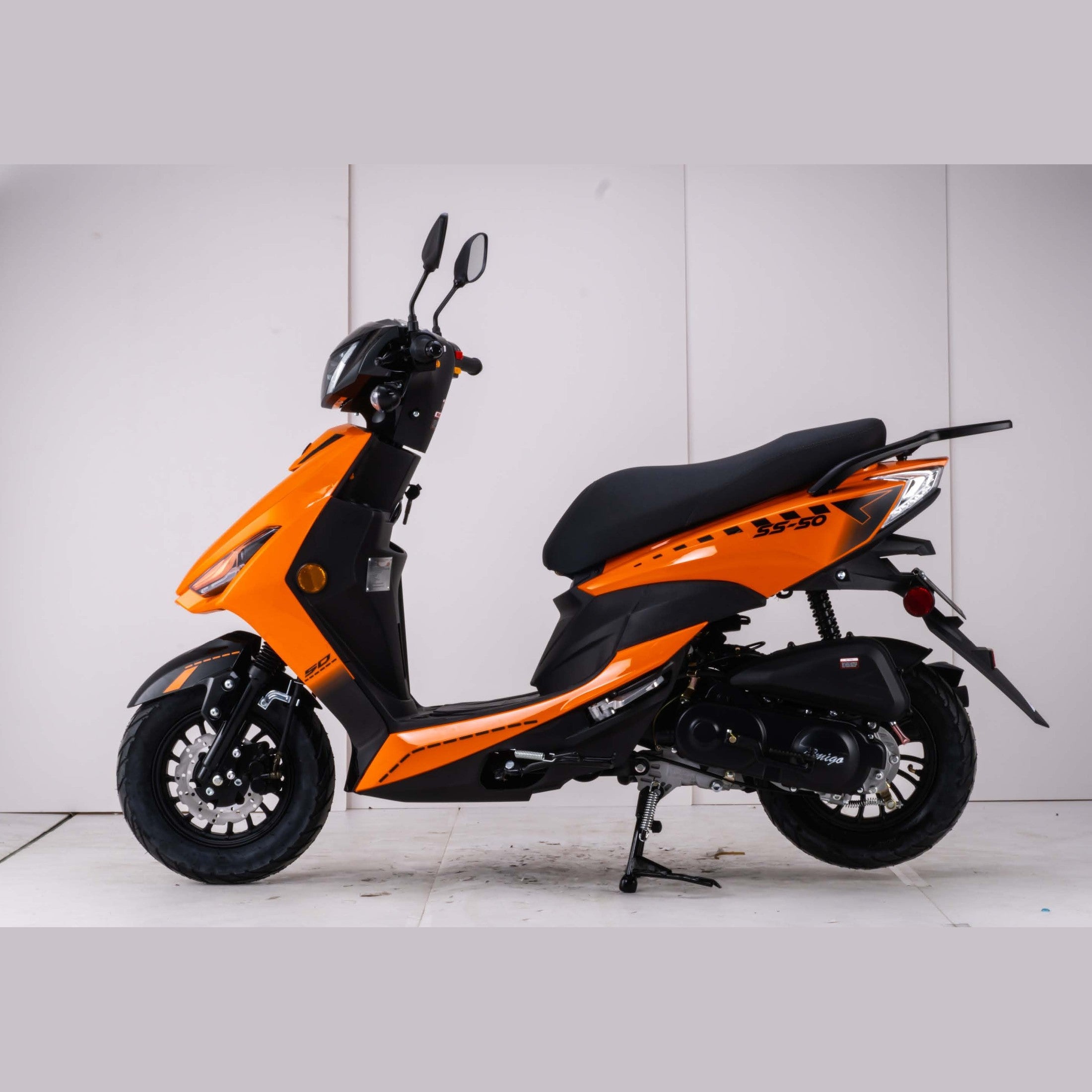 Orange Amigo SS-200 scooter side profile showing engine casing and disc brakes