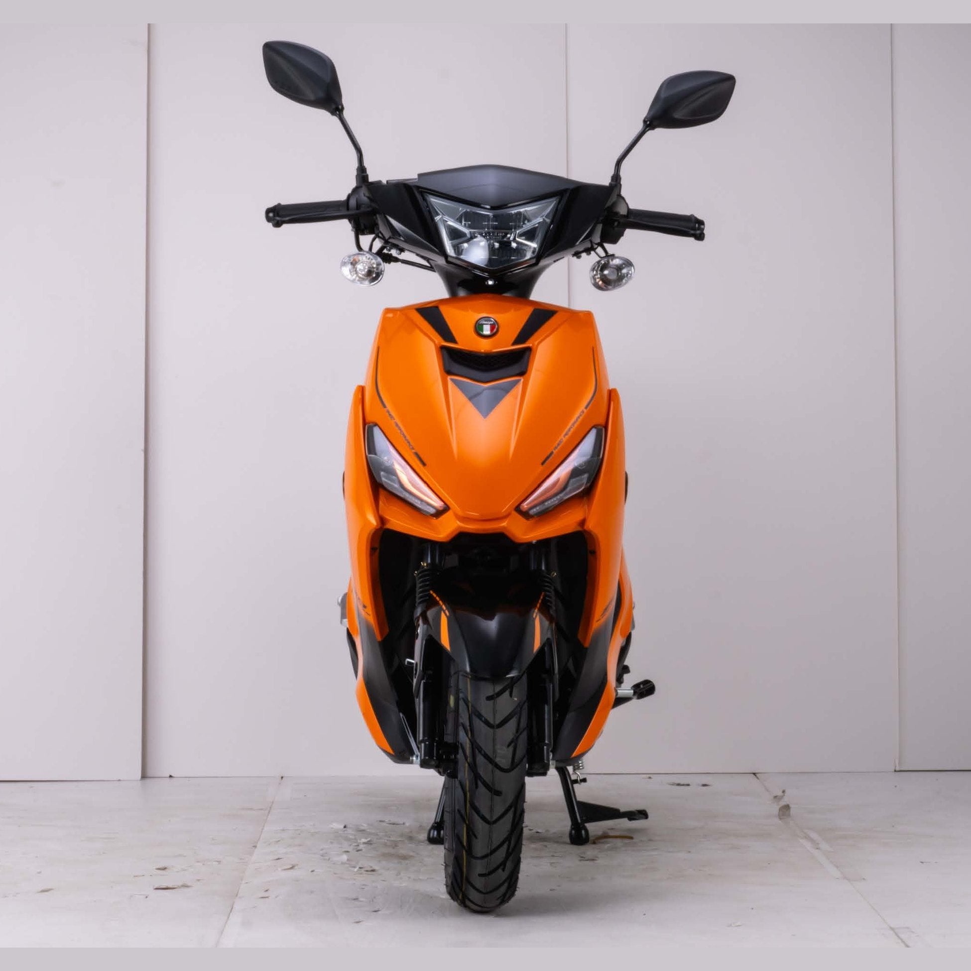 Orange Amigo SS-200 scooter front view with angular fairing design