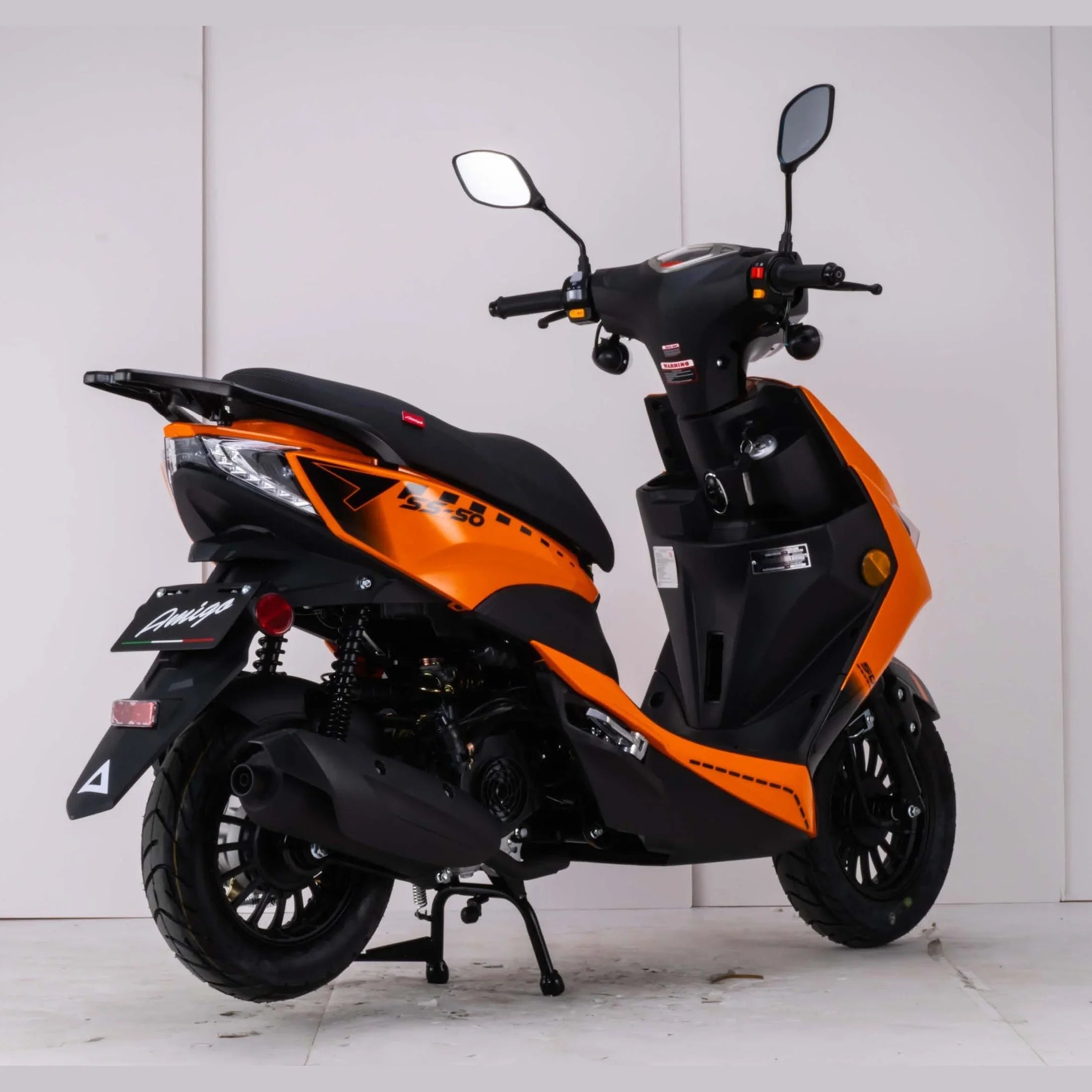 Orange and black Amigo SS-200 scooter rear three-quarter angle with taillight