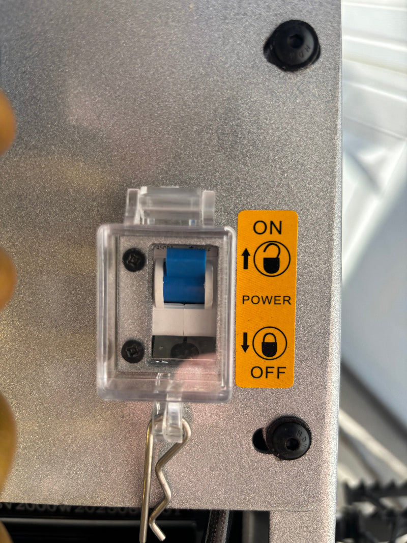 Close-up of a power switch for the hoverhearts dirt bike