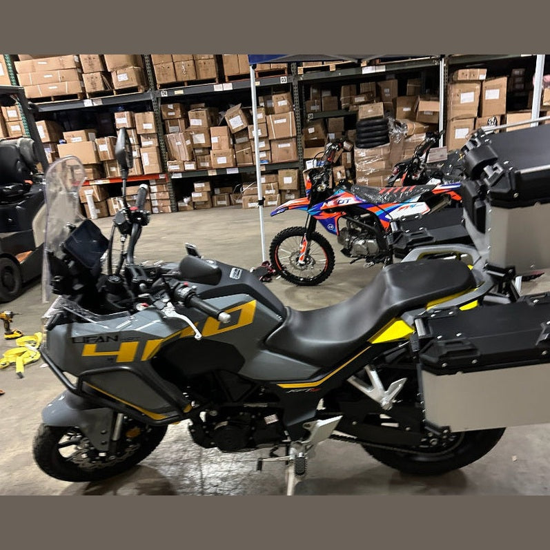 Gray Lifan 400 adventure motorcycle with yellow stripes and silver luggage