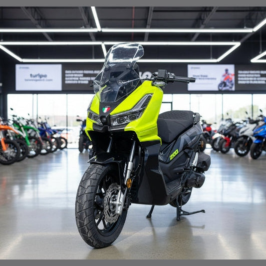 Lime green Amigo 200 scooter in showroom with tall windshield and Italian emblem