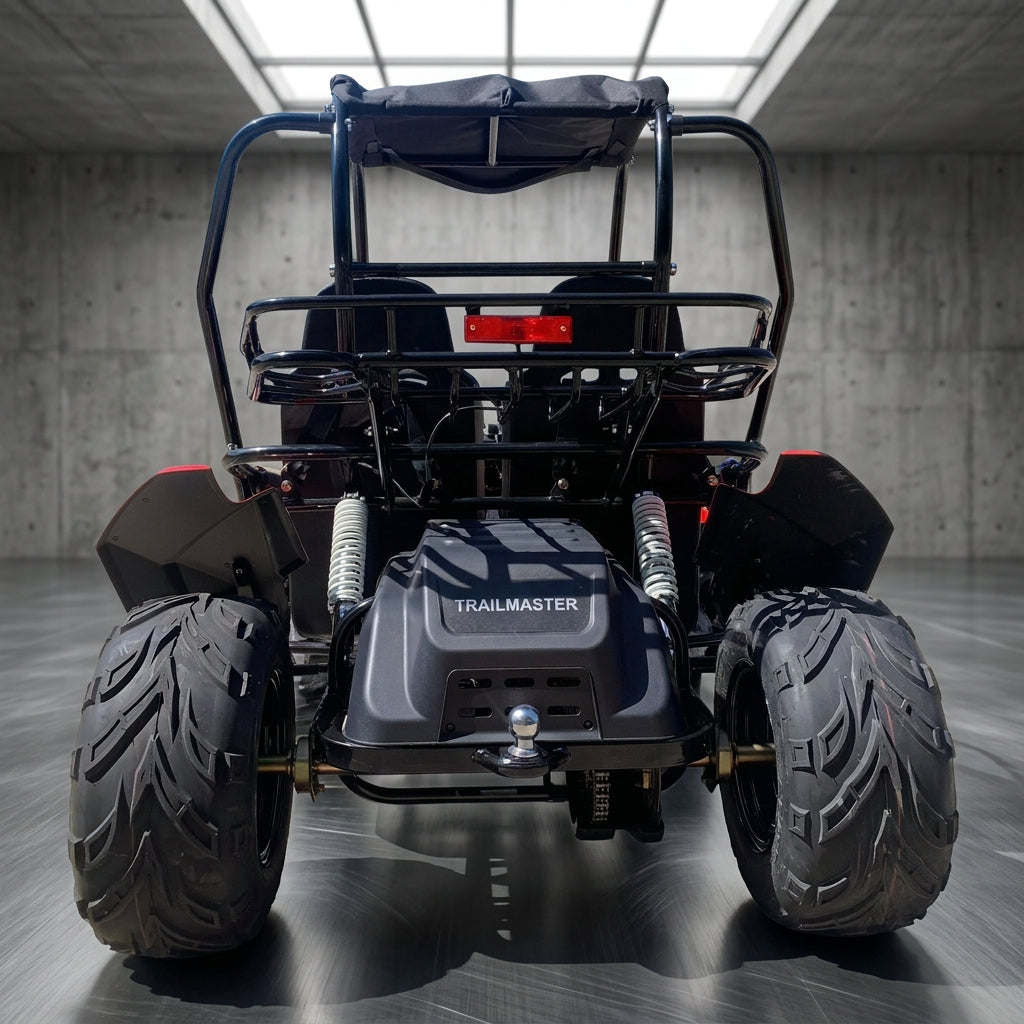 Black TrailMaster Blazer i2K go kart rear view with dual shocks and license plate holder