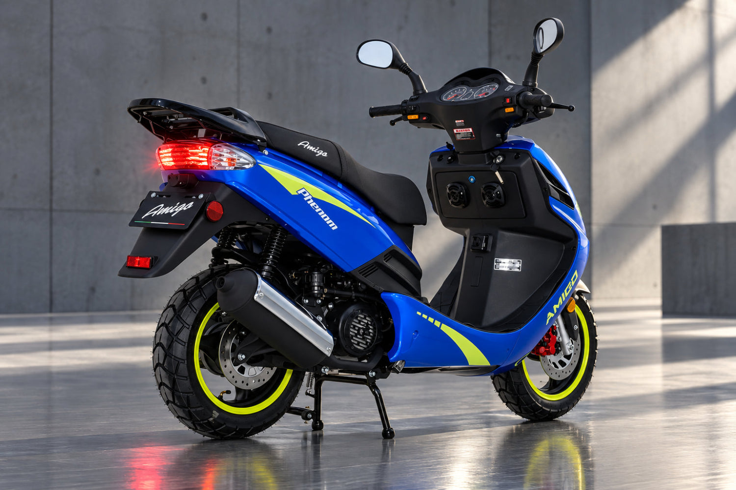 Blue Amigo Phenom 200cc scooter rear view with yellow rims and taillight