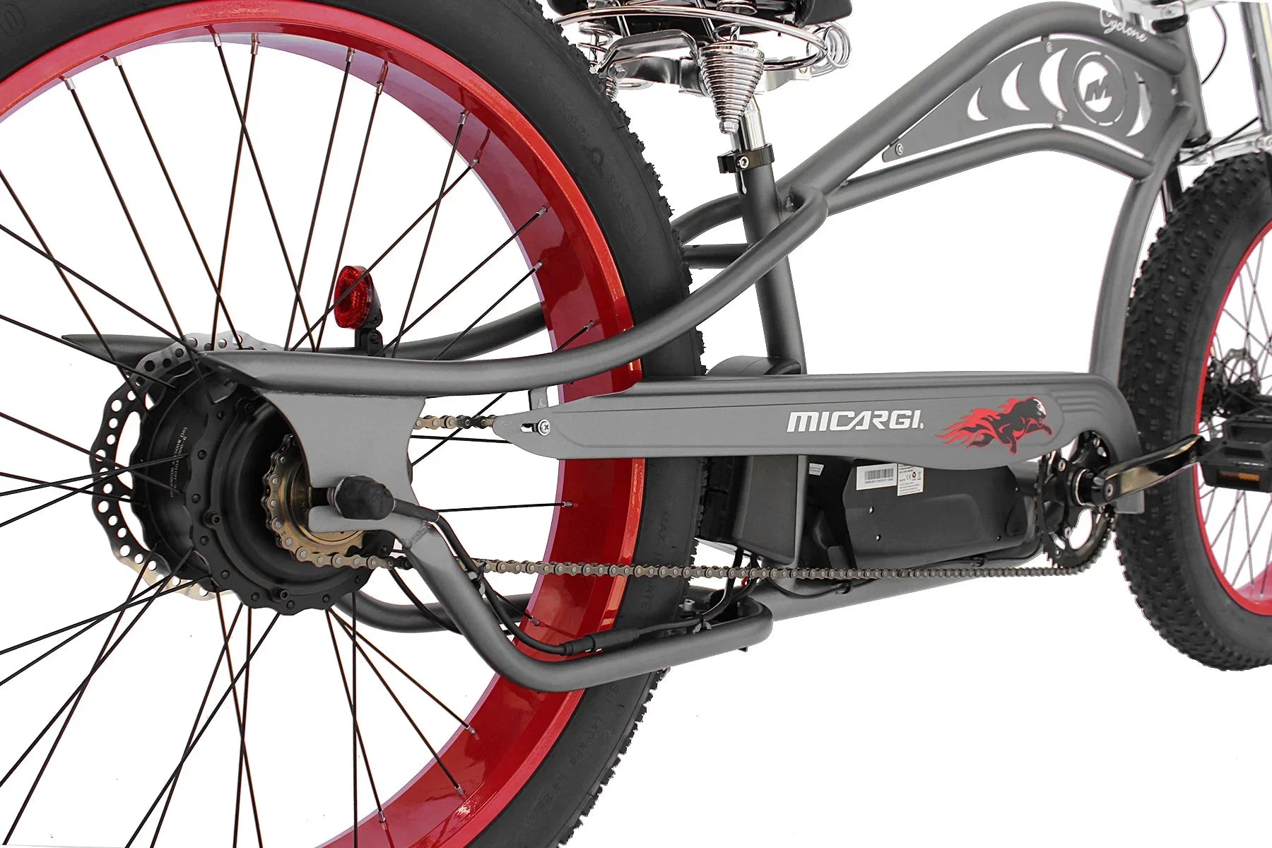 Micargi electric bike with red rims and flame design, featuring disc brakes and chain drive