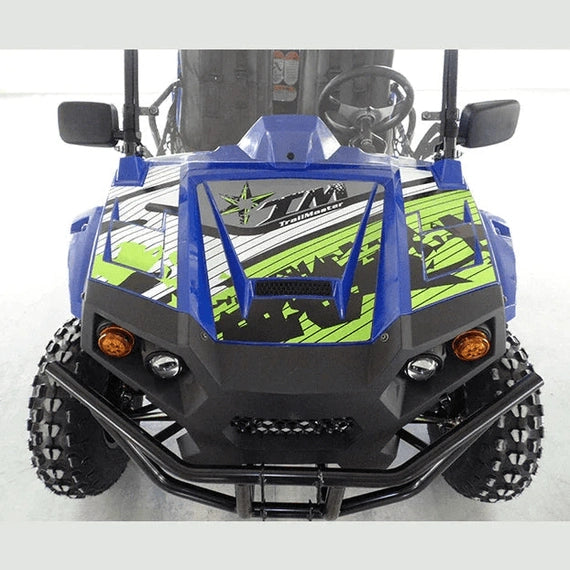 Blue TrailMaster Challenger UTV front close-up with upper brush guard, headlights, and star logo decal