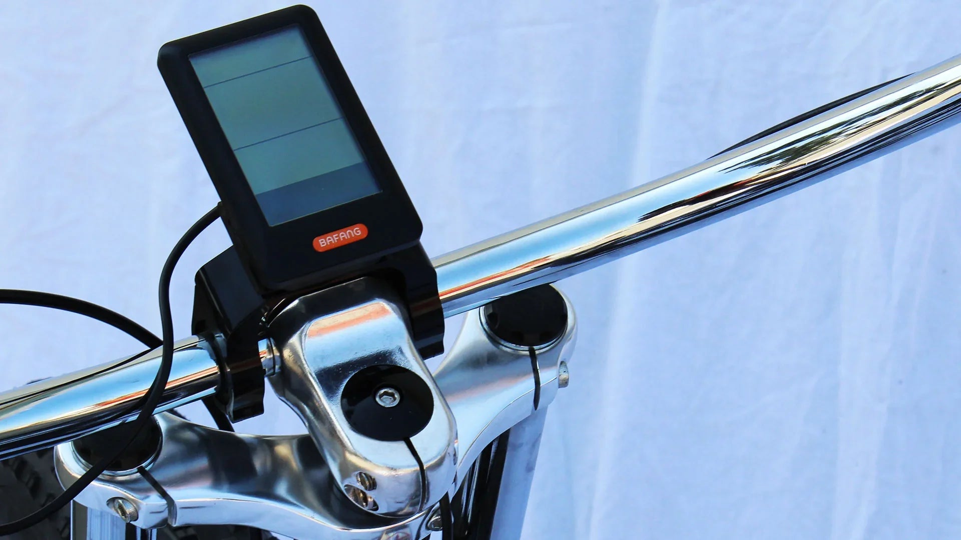 Bafang digital display mounted on chrome handlebar for electric bike or scooter
