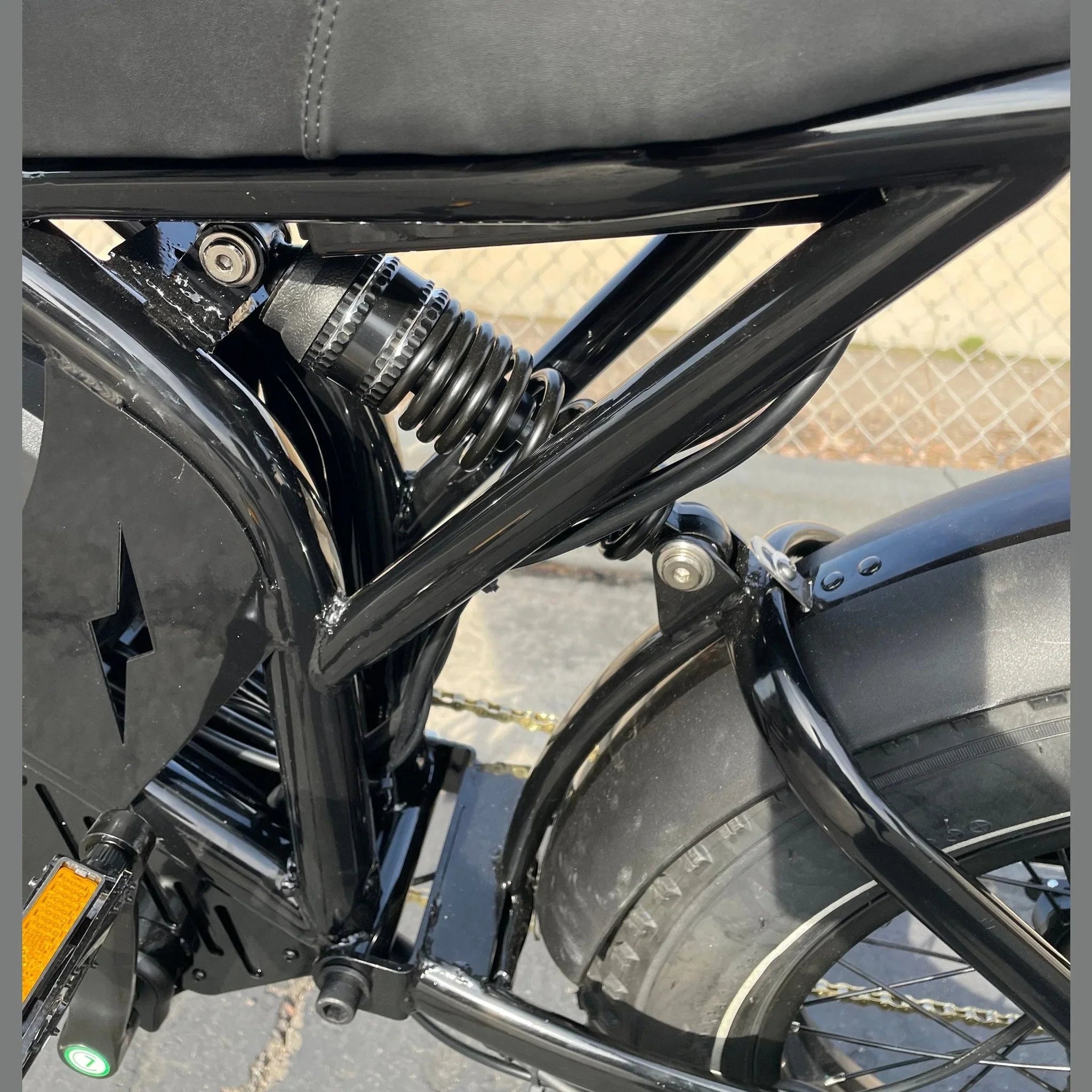 HappyRun G70 electric bike rear suspension shock and battery casing detail