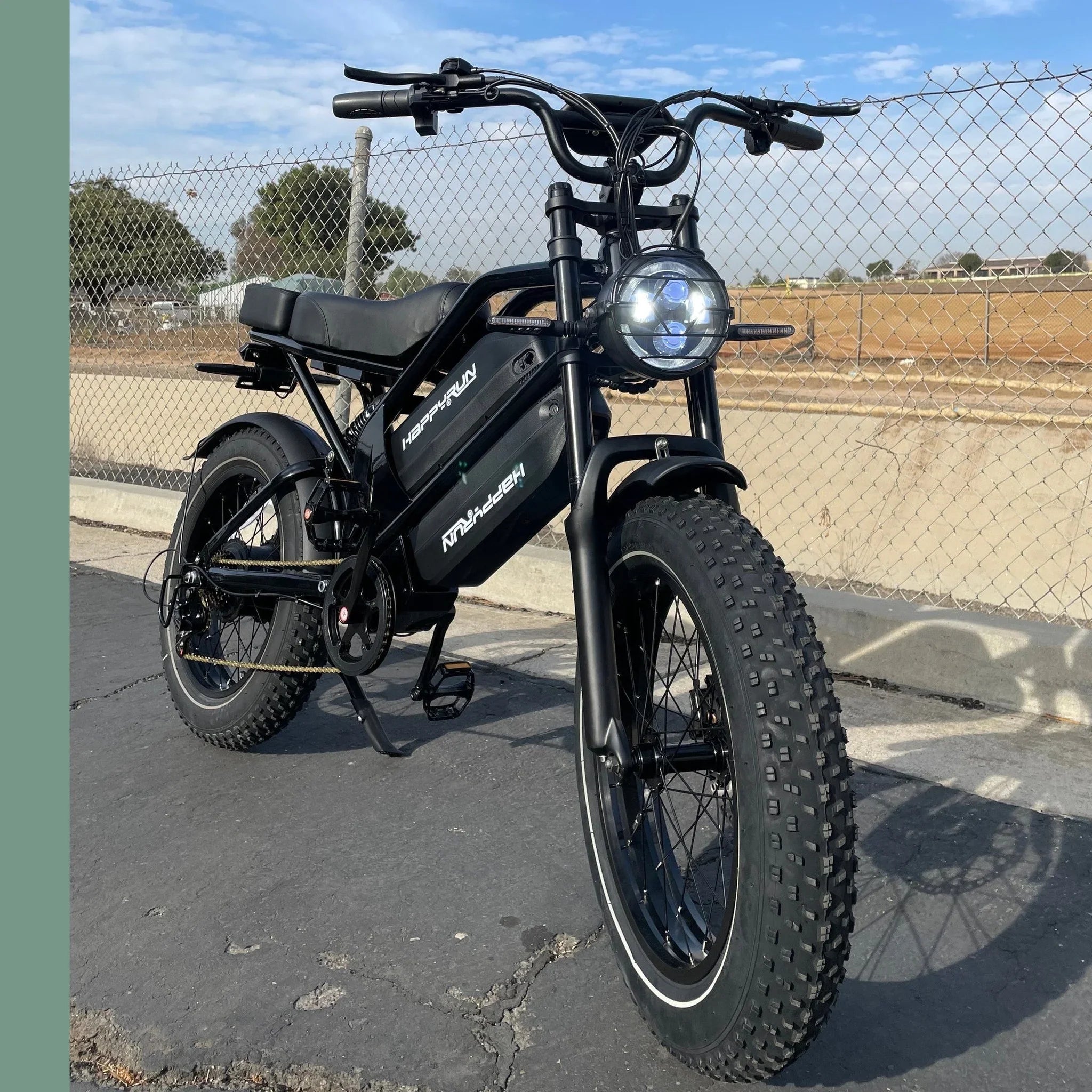 Three-quarter view of HappyRun G70 electric bike on asphalt