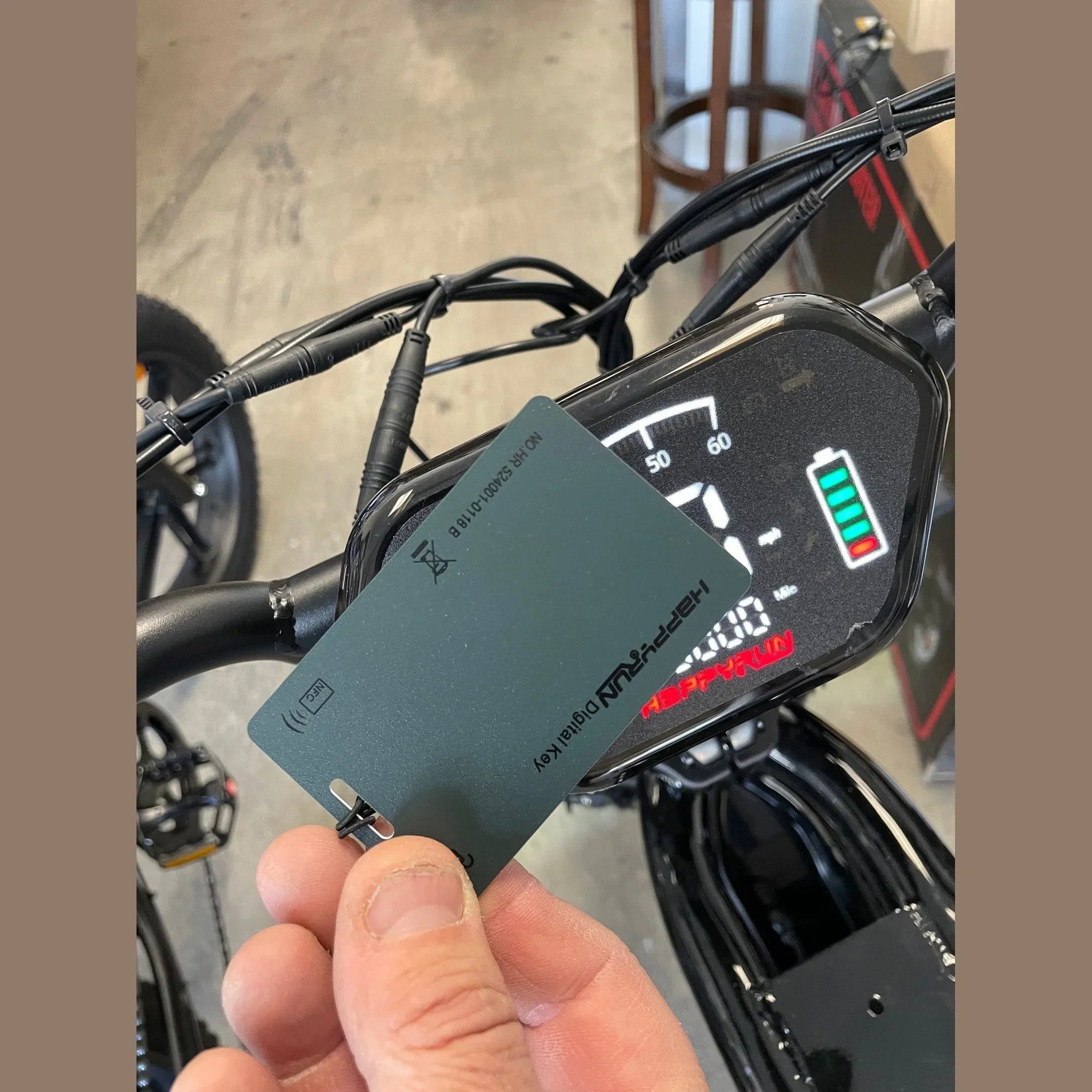 HappyRun G70 electric bike NFC digital key unlock close-up