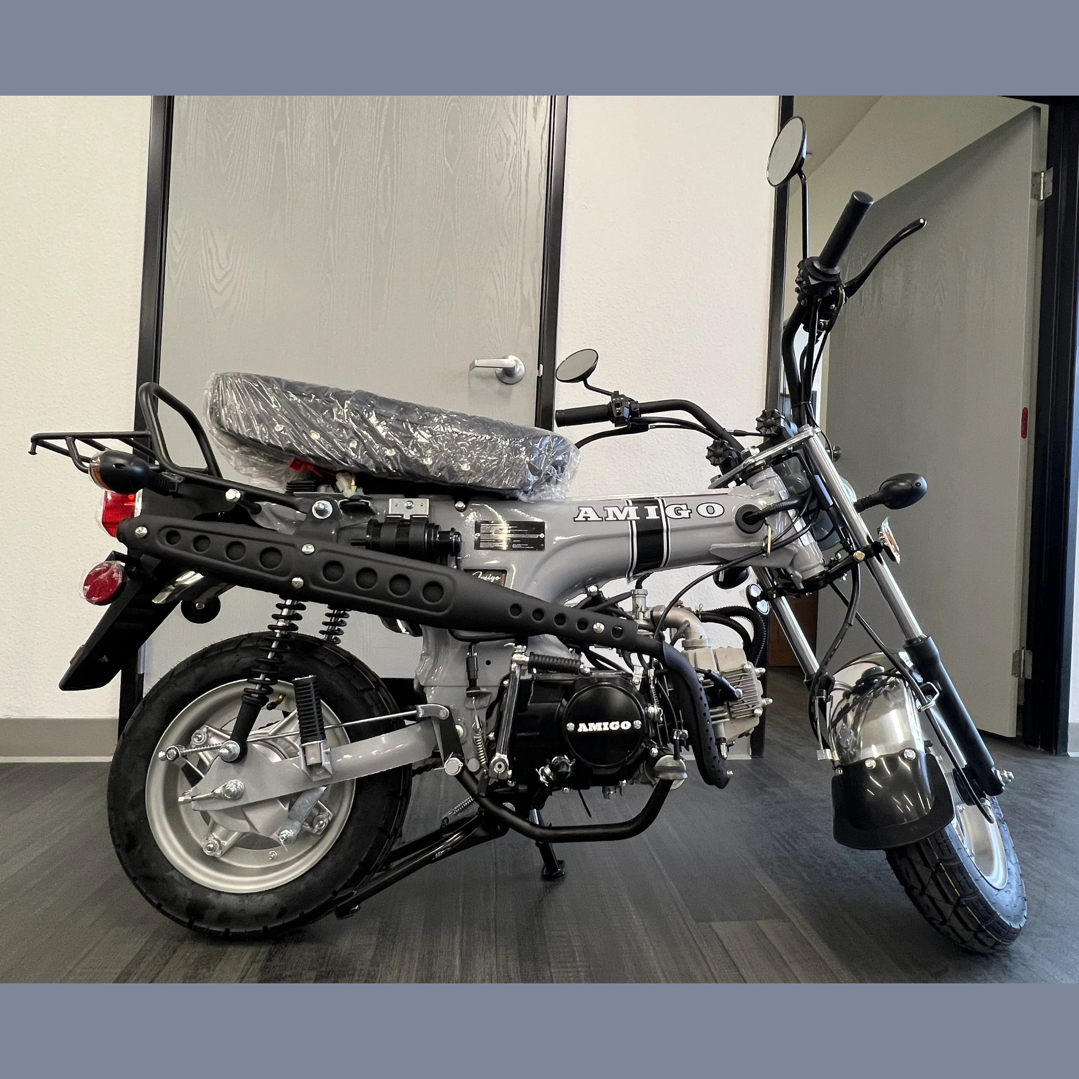 Gray Amigo Rocky 125cc mini motorcycle side profile with black accents