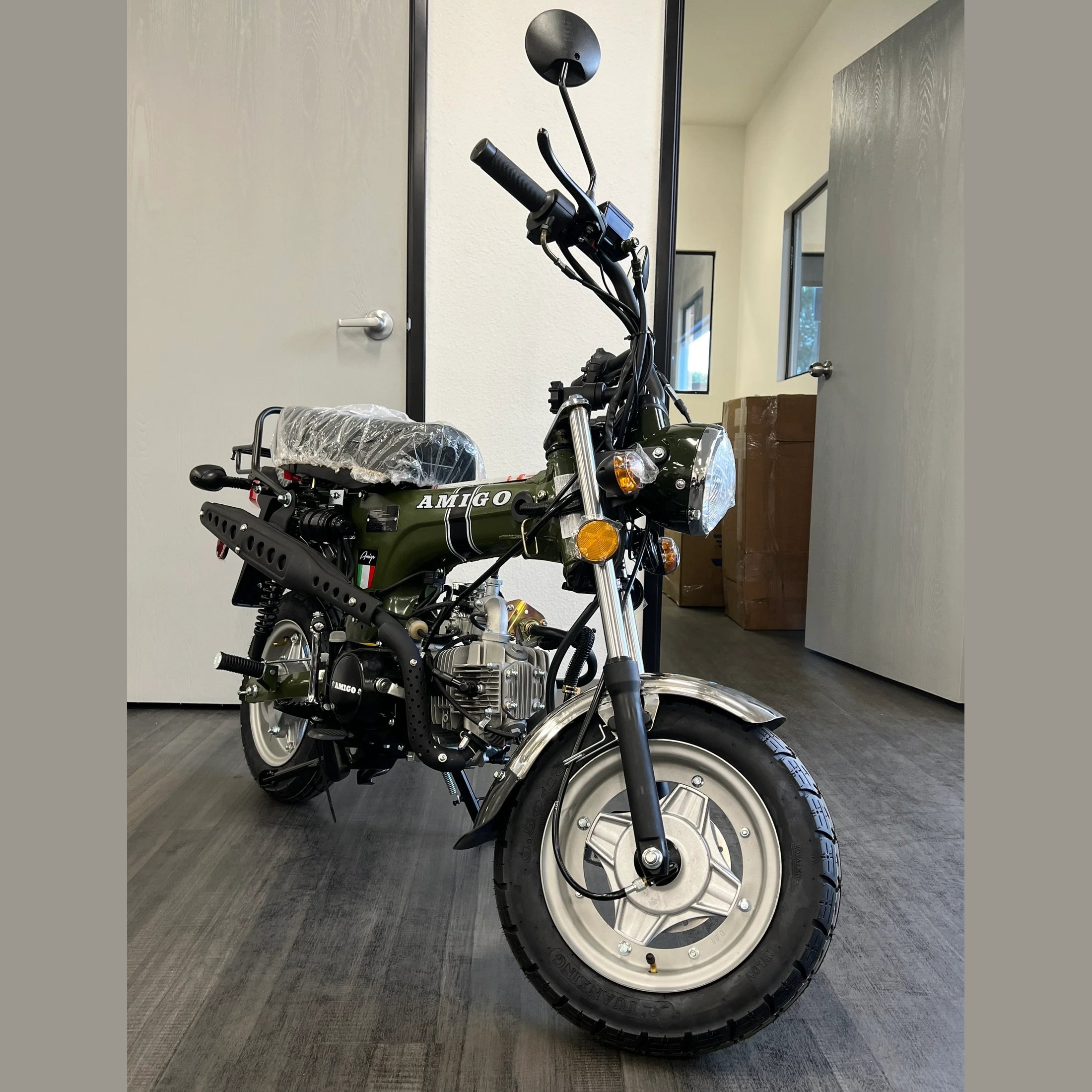 Olive green Amigo Rocky 125cc mini bike front view with black tank stripes