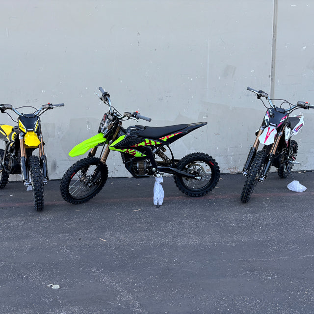 Three color options of Surron Hyper Bee electric dirt bikes lineup