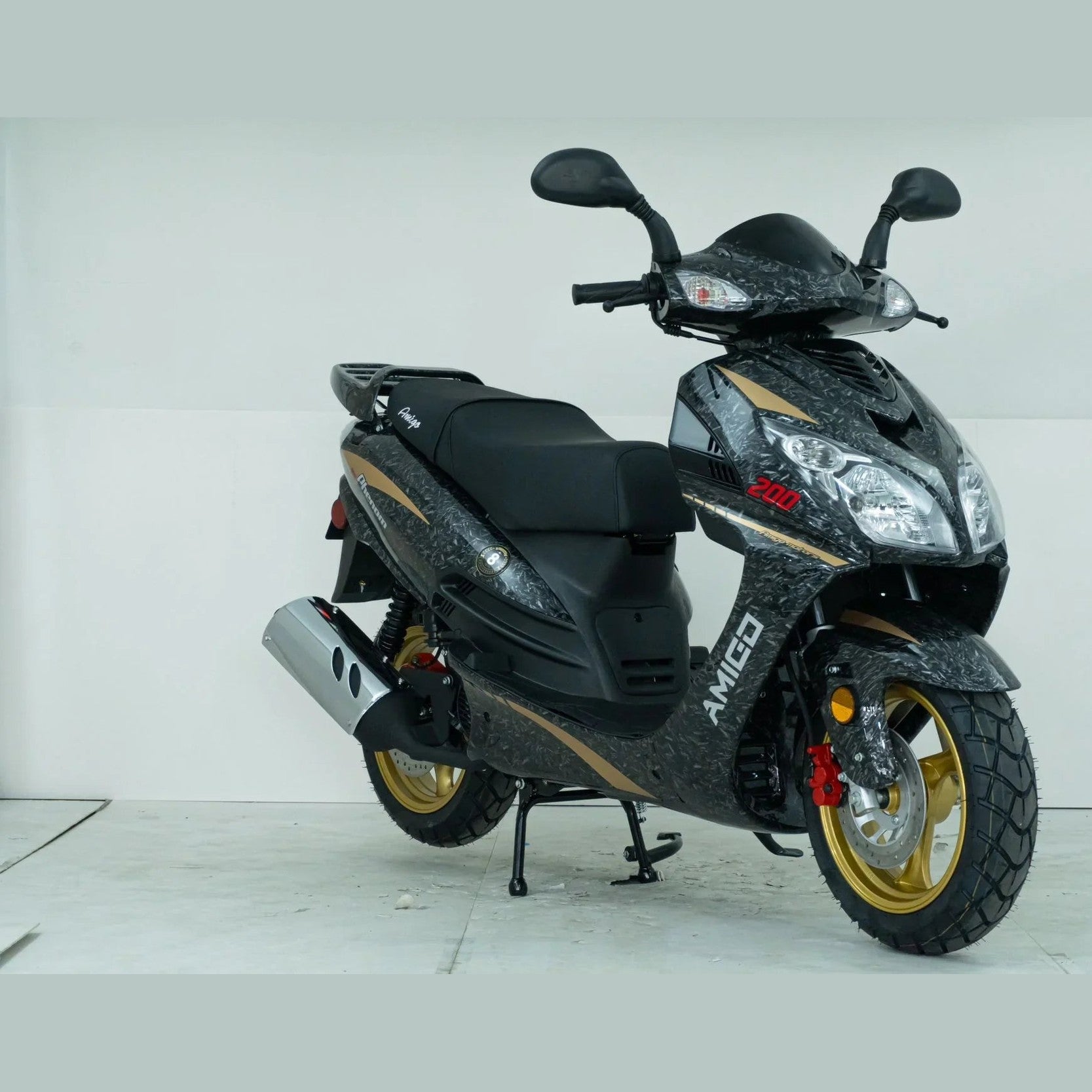 Black and gold Amigo 200cc scooter with dual headlights and gold wheels in a studio setting