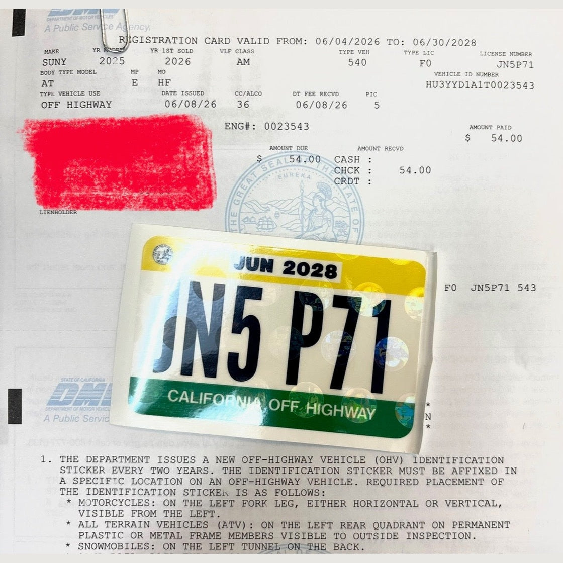 Surron Ultra Bee R California OHV sticker with 2028 expiration on registration document