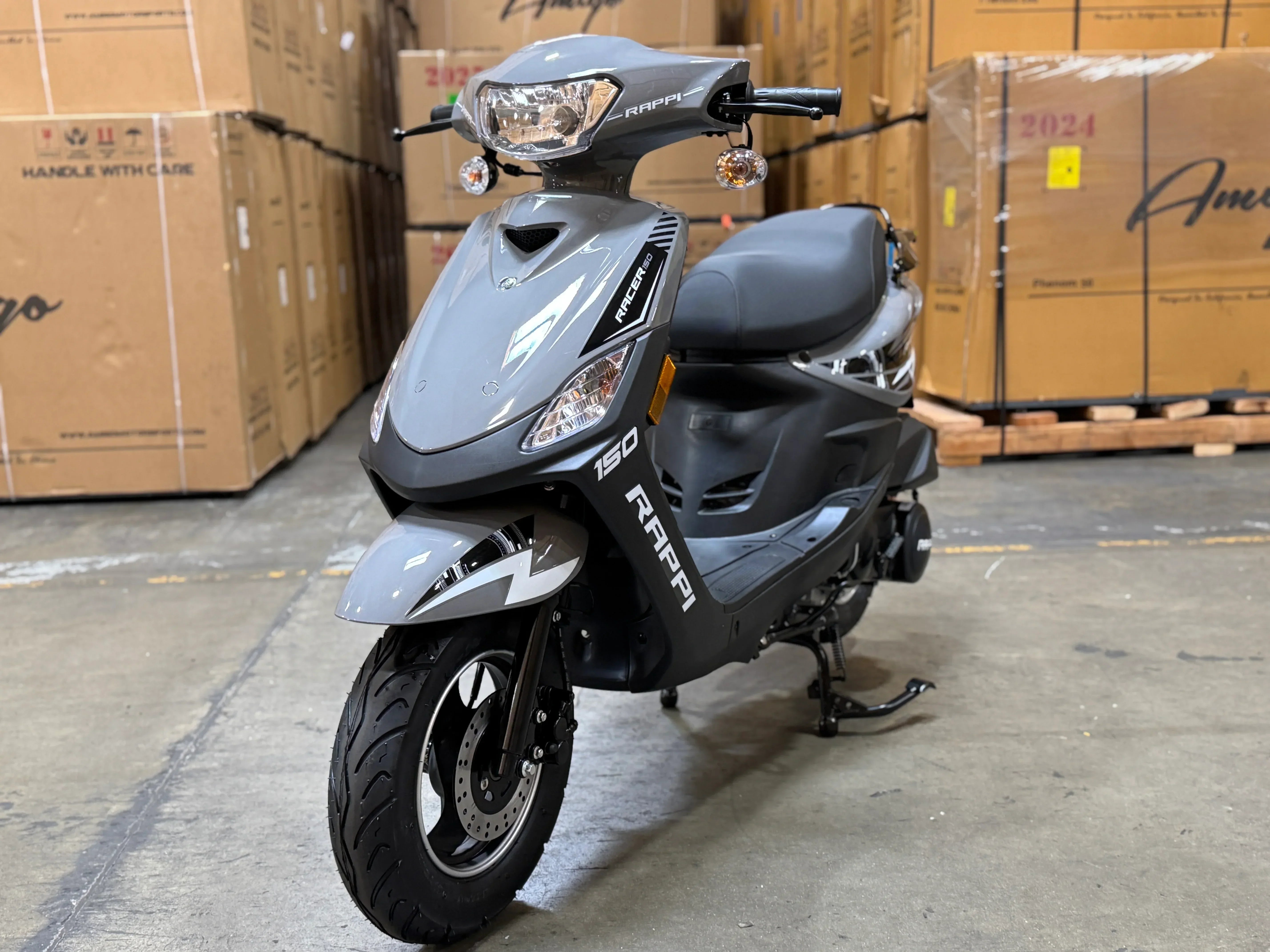 Gray Rappi Racer 150 scooter in warehouse, ideal for urban commuting and powersports enthusiasts.