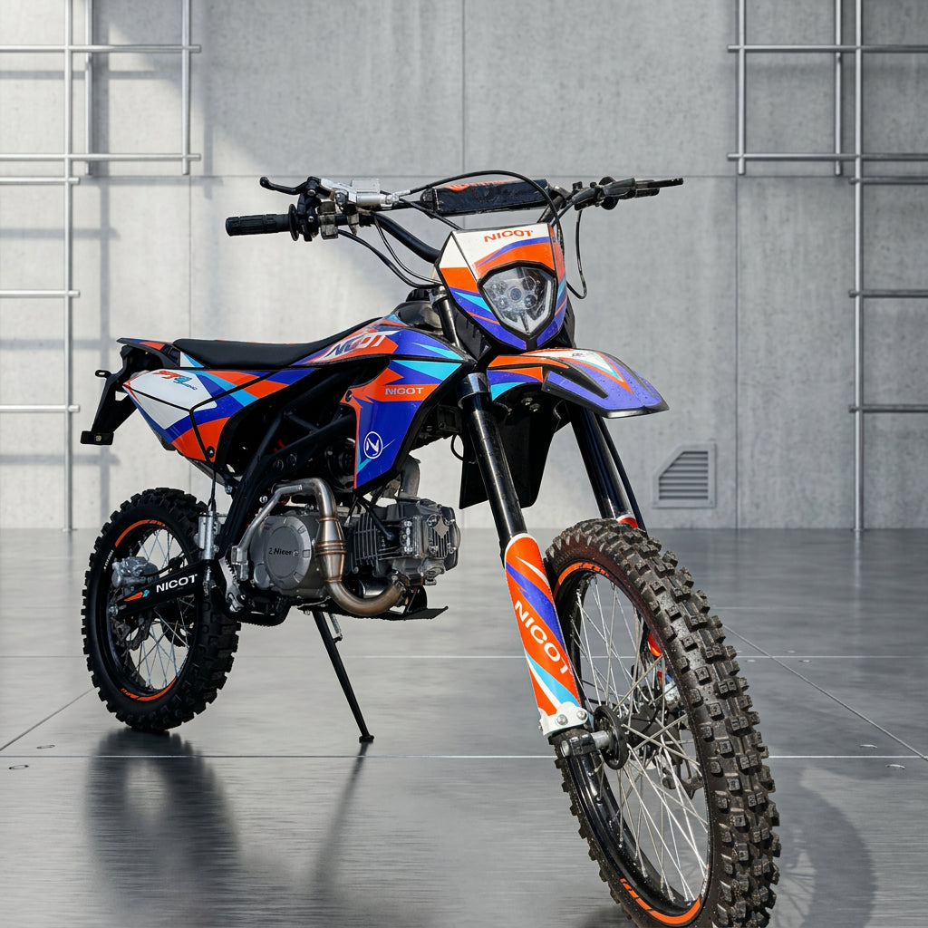 Front view of Nicot PT2 125W dirt bike with knobby tires and silver engine