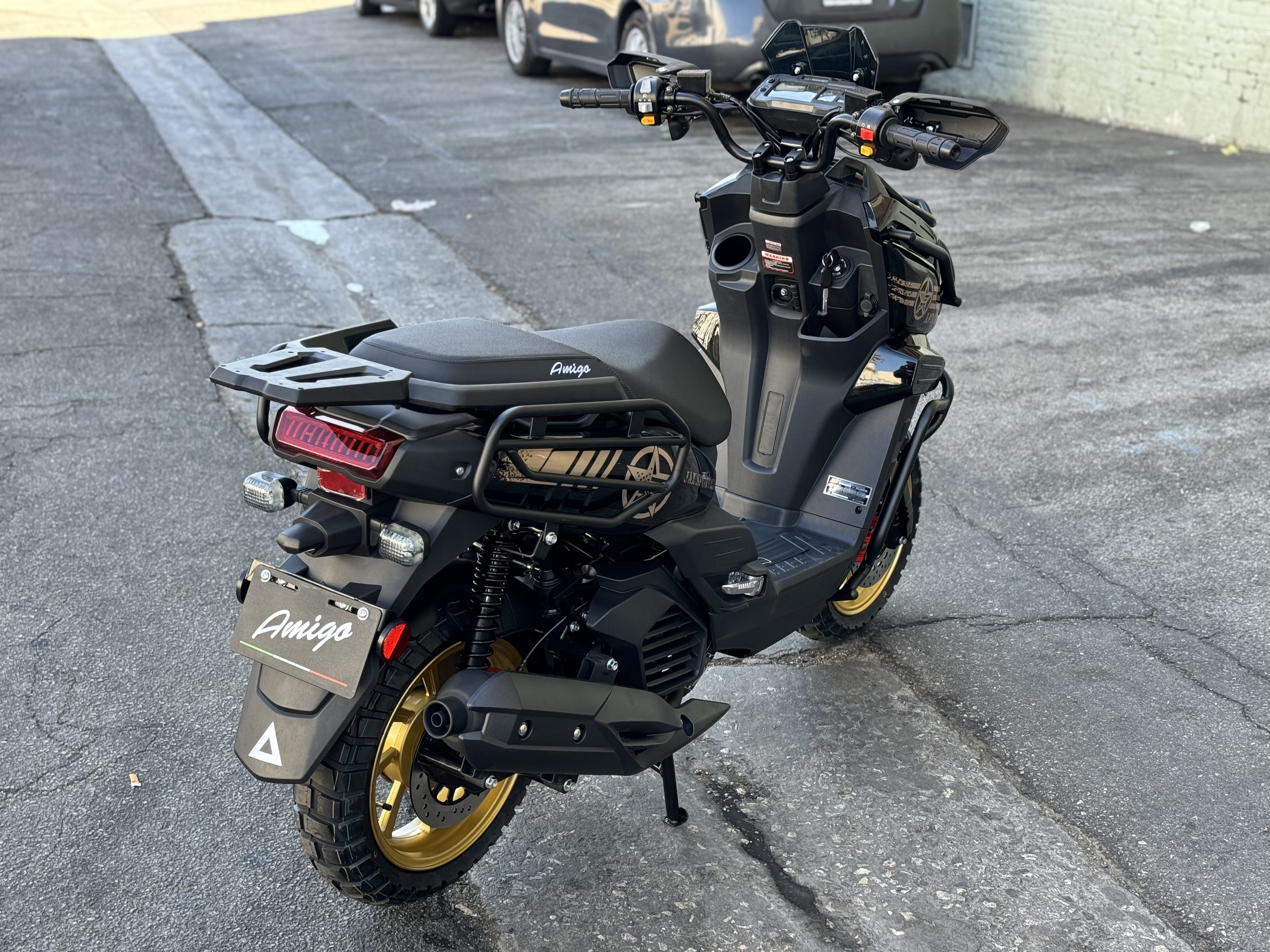 Amigo Jax Sport 200cc scooter rear view black with gold wheels