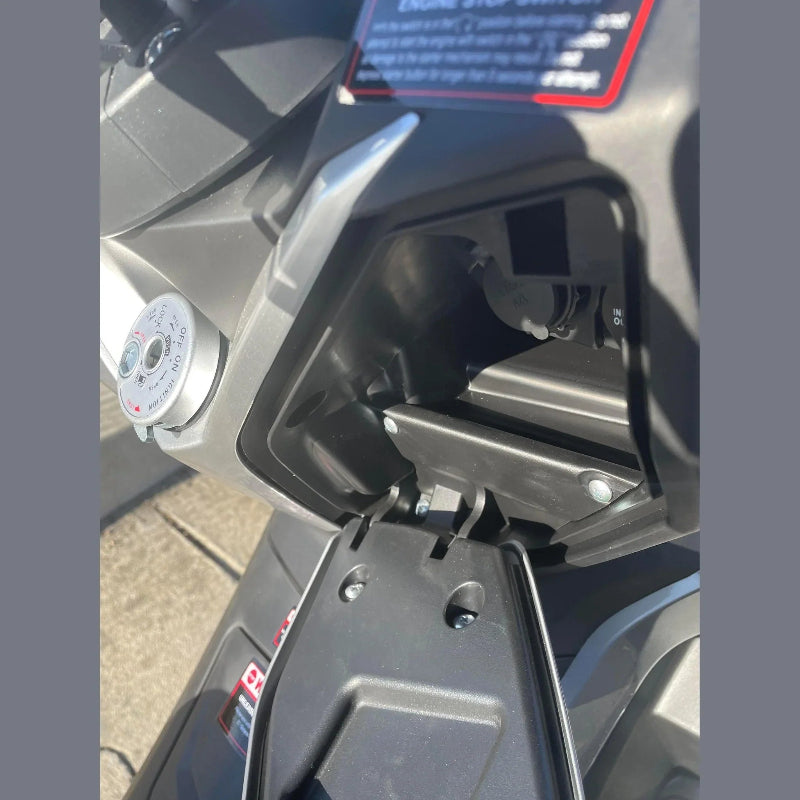 Lifan KPV 150 ADV open storage compartment with ignition key switch