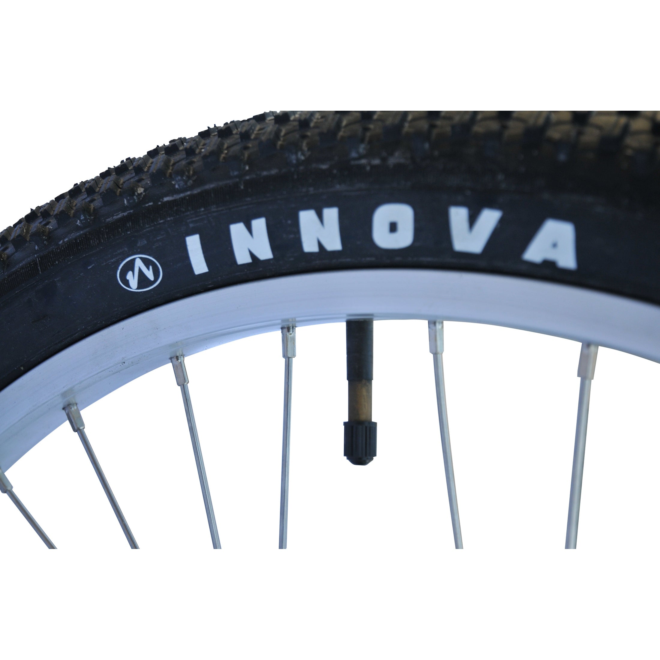 Innova brand tire and silver rim close-up on tandem electric bicycle