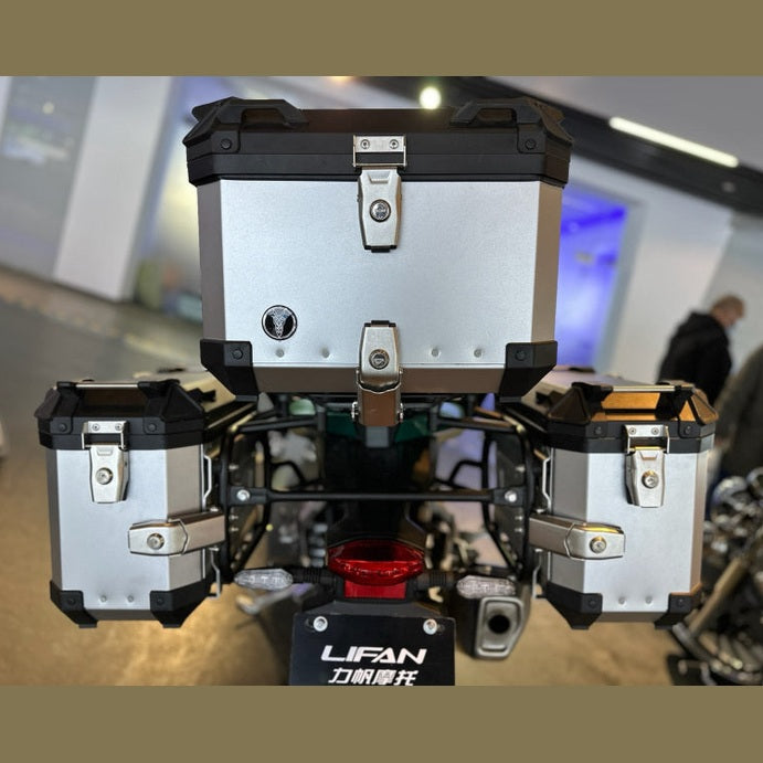 Rear view of white Lifan KPT 400 showing silver aluminum top case and side panniers