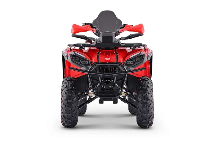 Red ATV with rugged tires and front bumper, ideal for off-road adventures and trail riding.