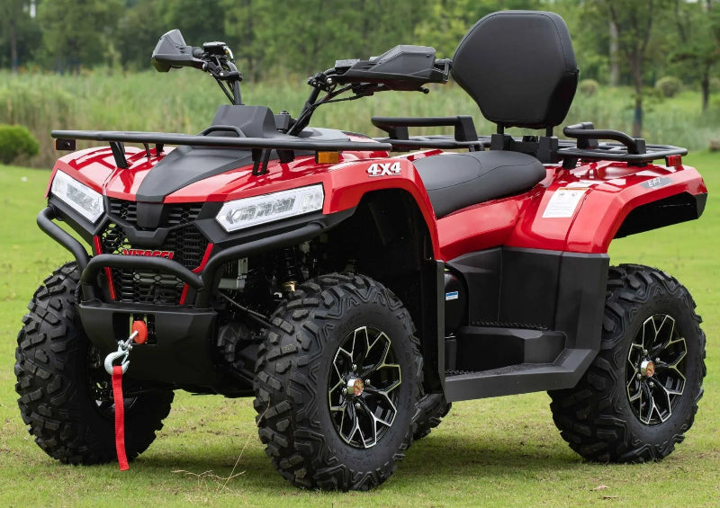 Red Vitacci Maximus 4x4 ATV with black accents, rugged tires, and rear cargo rack parked on grass