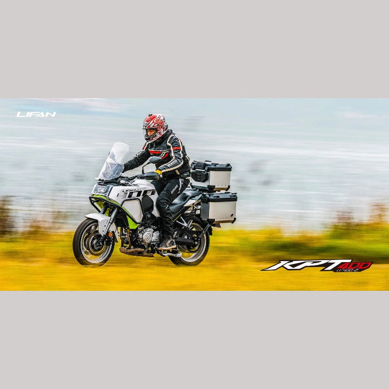 Rider on white and green Lifan KPT 400 adventure motorcycle in motion
