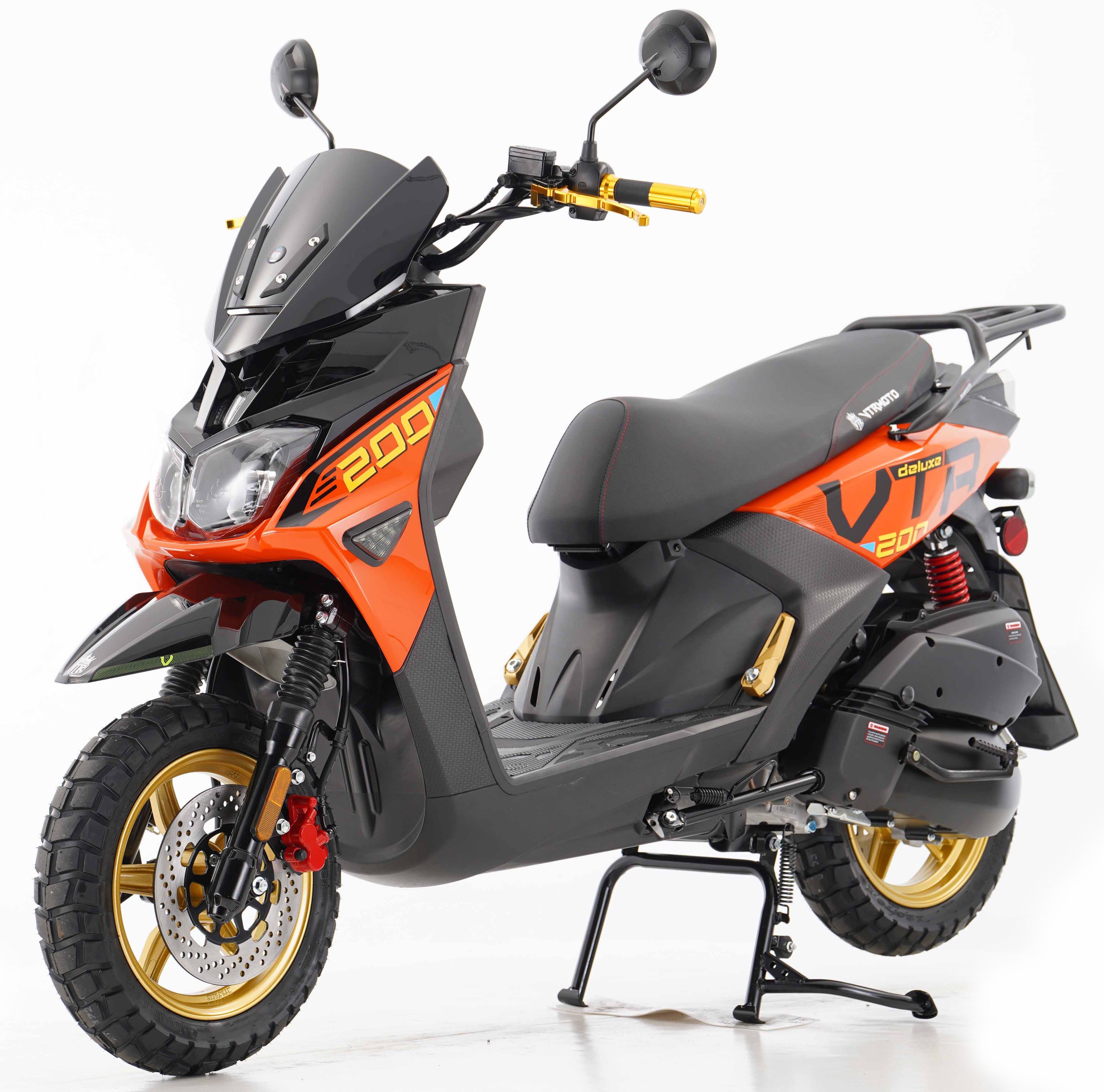 Orange and black 200cc VTR scooter with luggage rack and yellow decals