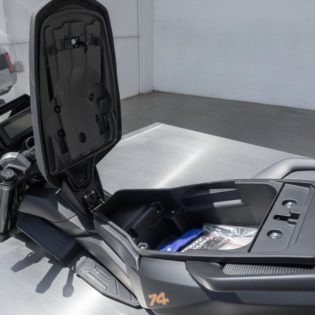 Close-up of Supermach GC300T maxi scooter front storage compartment interior