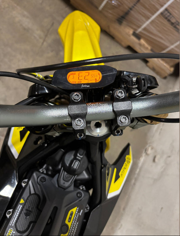 Surron Hyper Bee yellow electric dirt bike digital display handlebar close-up