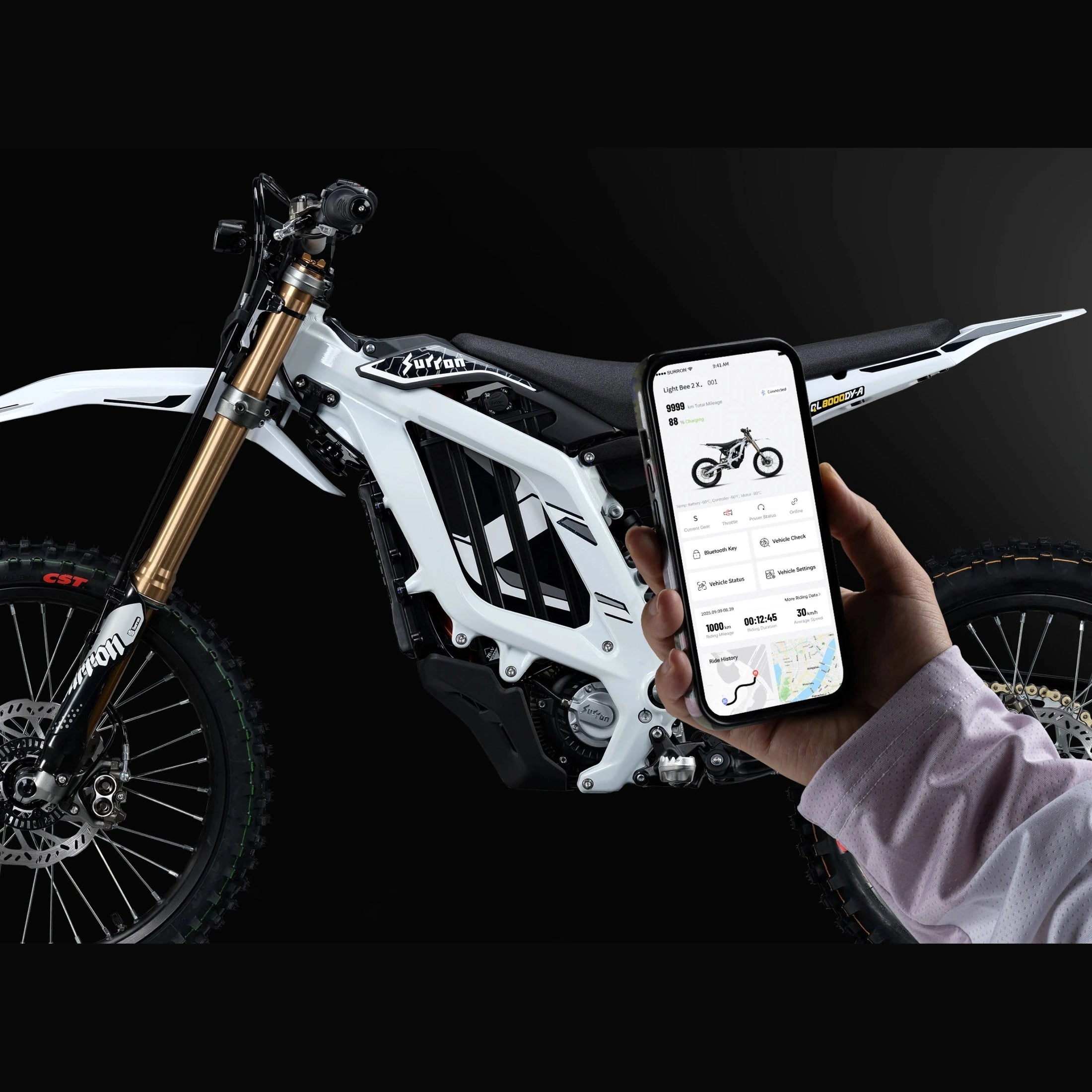 White Surron Light Bee 2 X connected to smartphone app displaying battery status