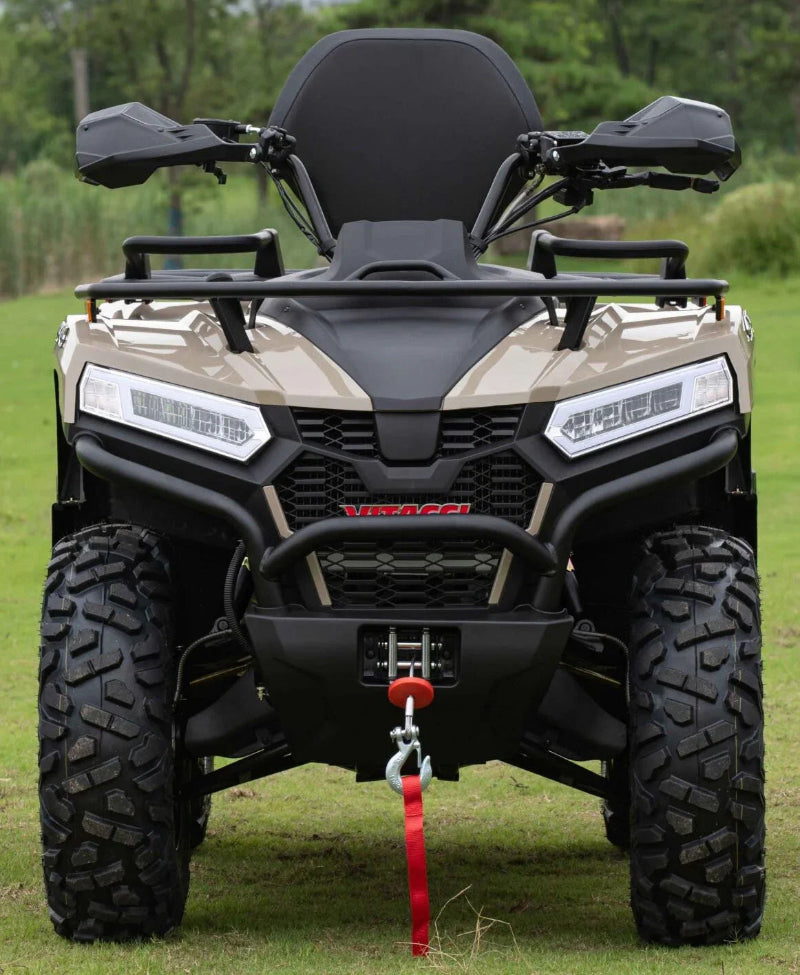 Tan and black MAXIMUS 450ccL EFI Vitacci ATV with LED lights, rugged tires, and front tow hook on grass