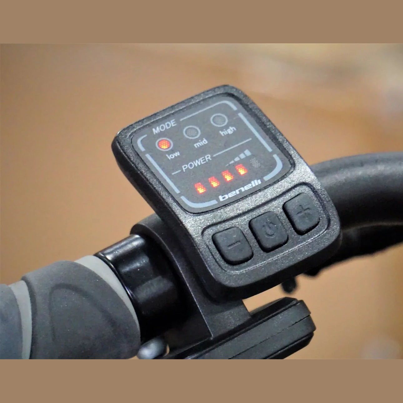 Close-up of Benelli digital control panel with mode selection and LED power bars
